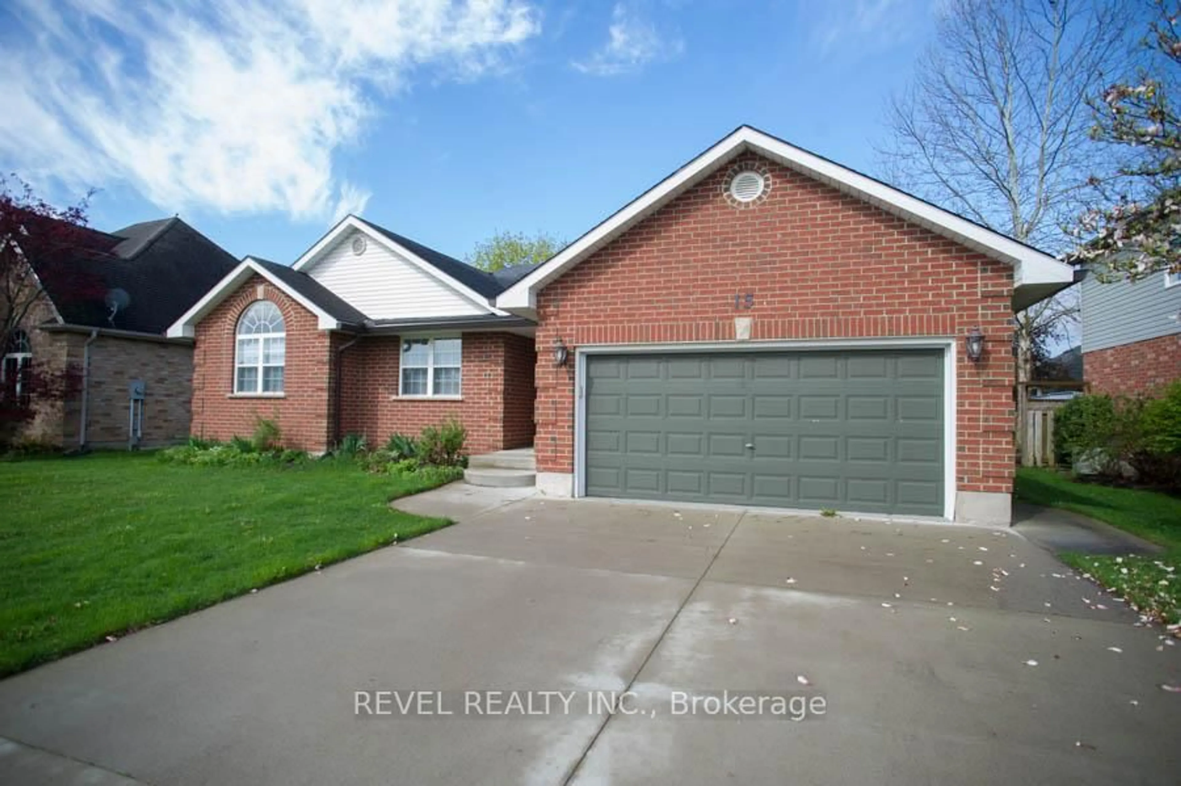 Home with brick exterior material, street for 15 Dogwood Dr, Tillsonburg Ontario N4G 5S5