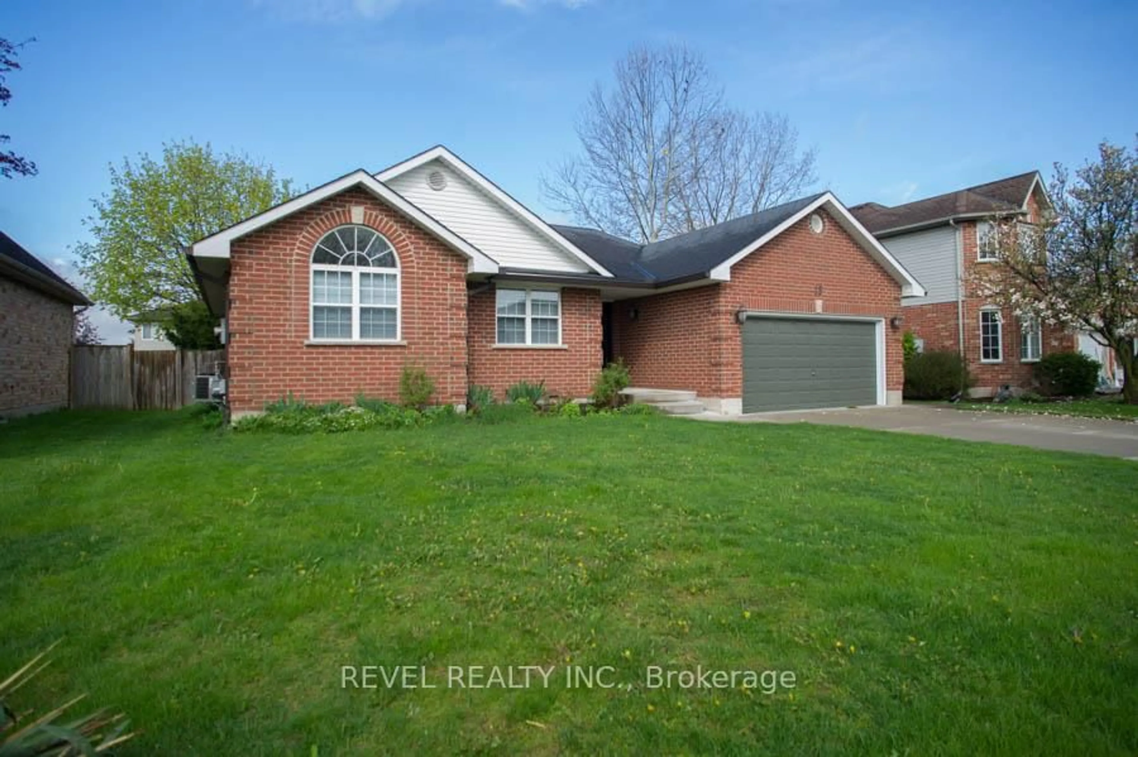 Home with brick exterior material, street for 15 Dogwood Dr, Tillsonburg Ontario N4G 5S5