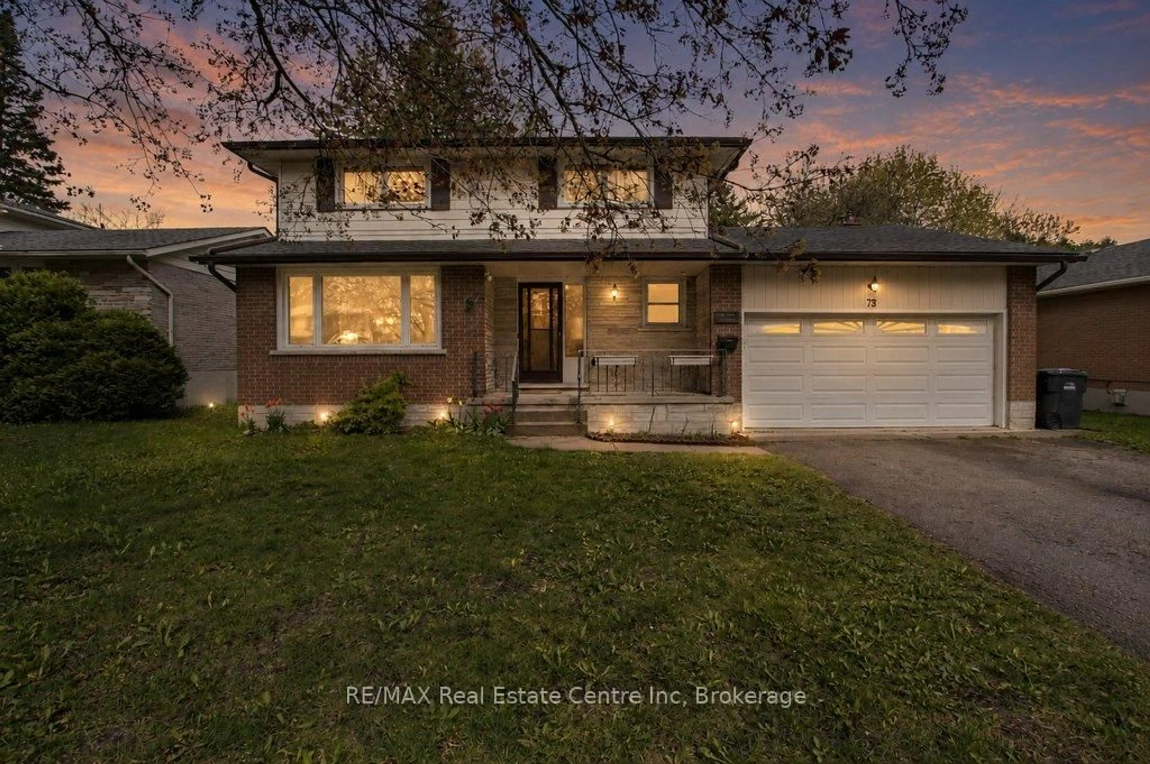 Home with brick exterior material, street for 73 Harvard Rd, Guelph Ontario N1G 2X9