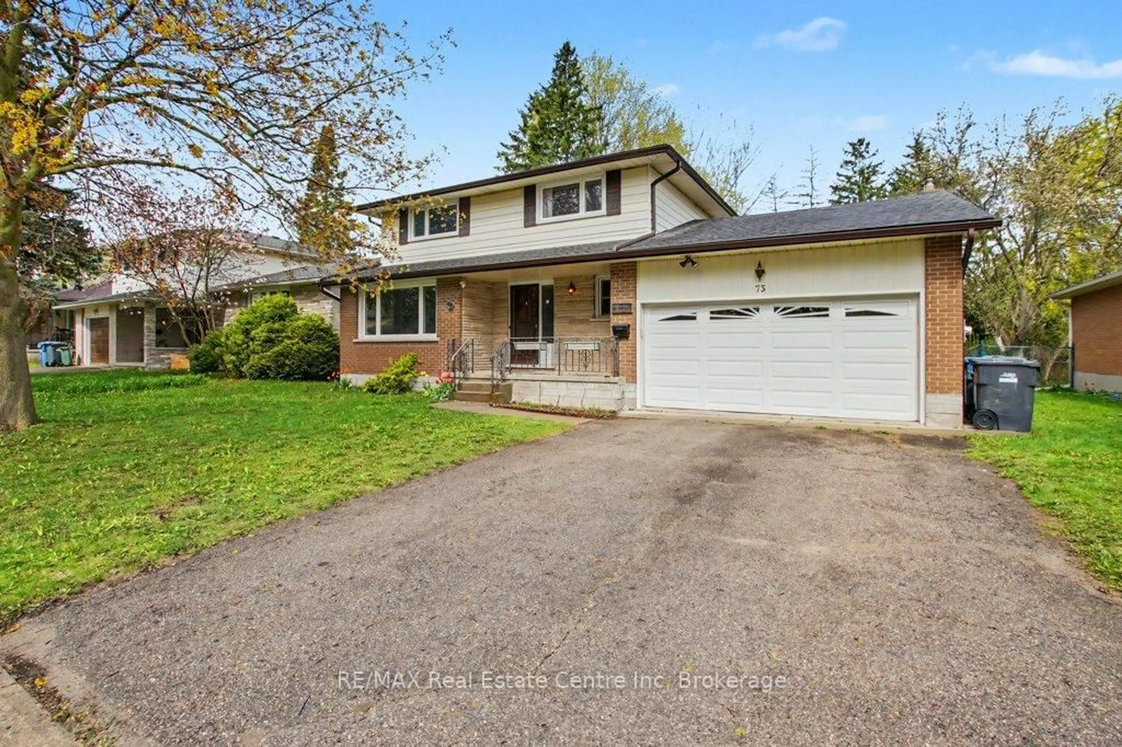 Home with vinyl exterior material, street for 73 Harvard Rd, Guelph Ontario N1G 2X9