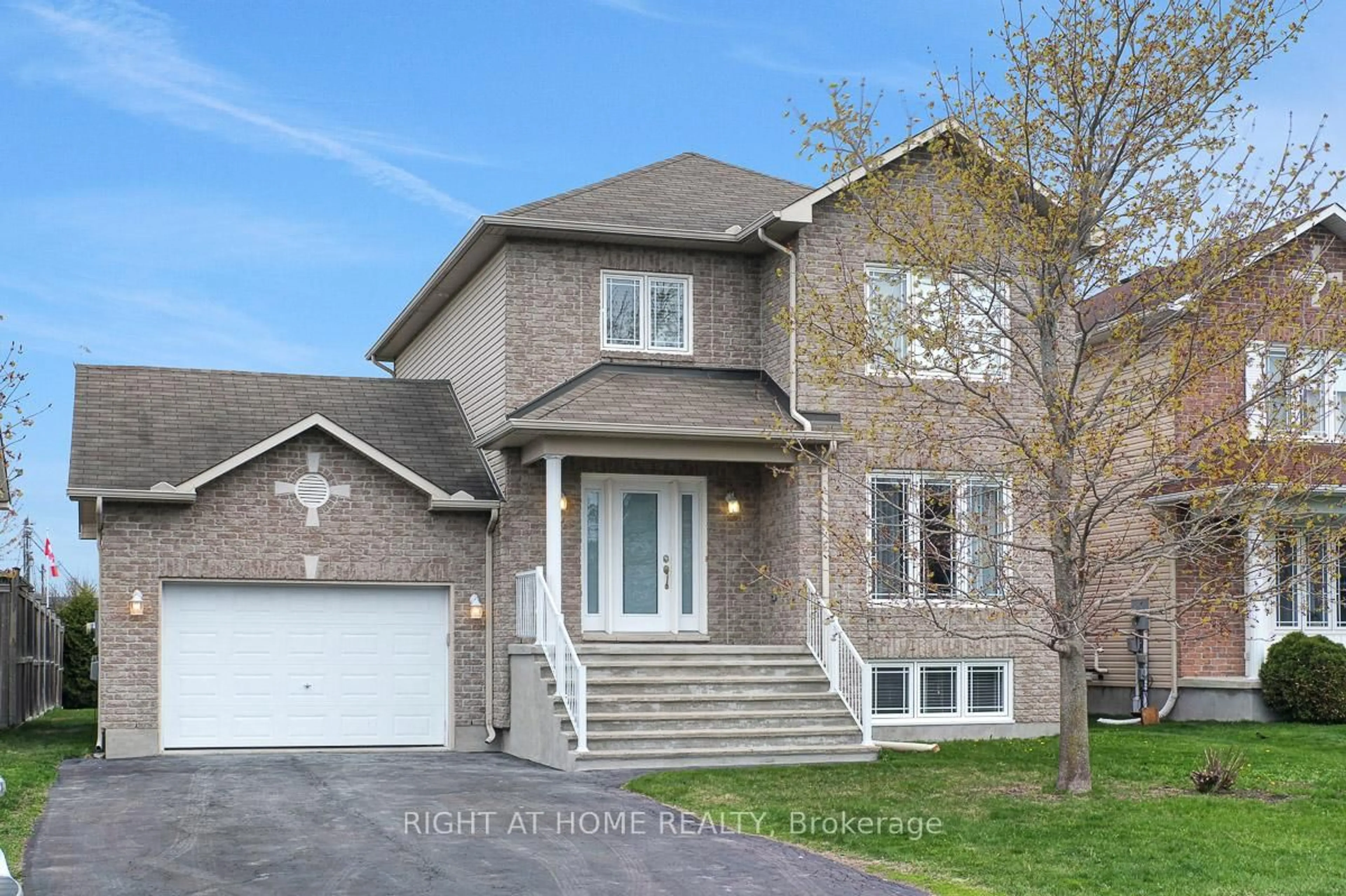 Home with brick exterior material, street for 27 Manoir St, Russell Ontario K0A 1W0