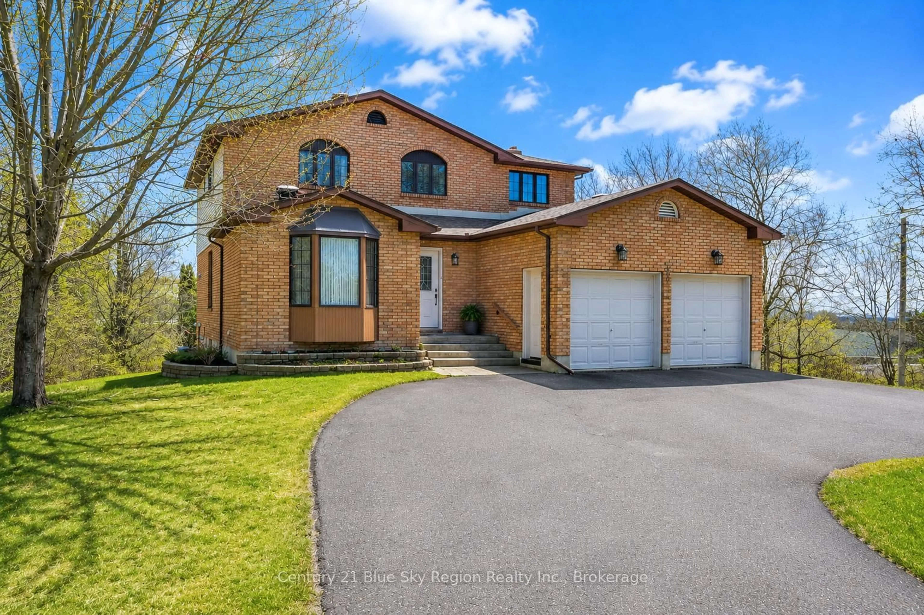 Home with brick exterior material, street for 823 Golf Club Rd, North Bay Ontario P1B 8G2