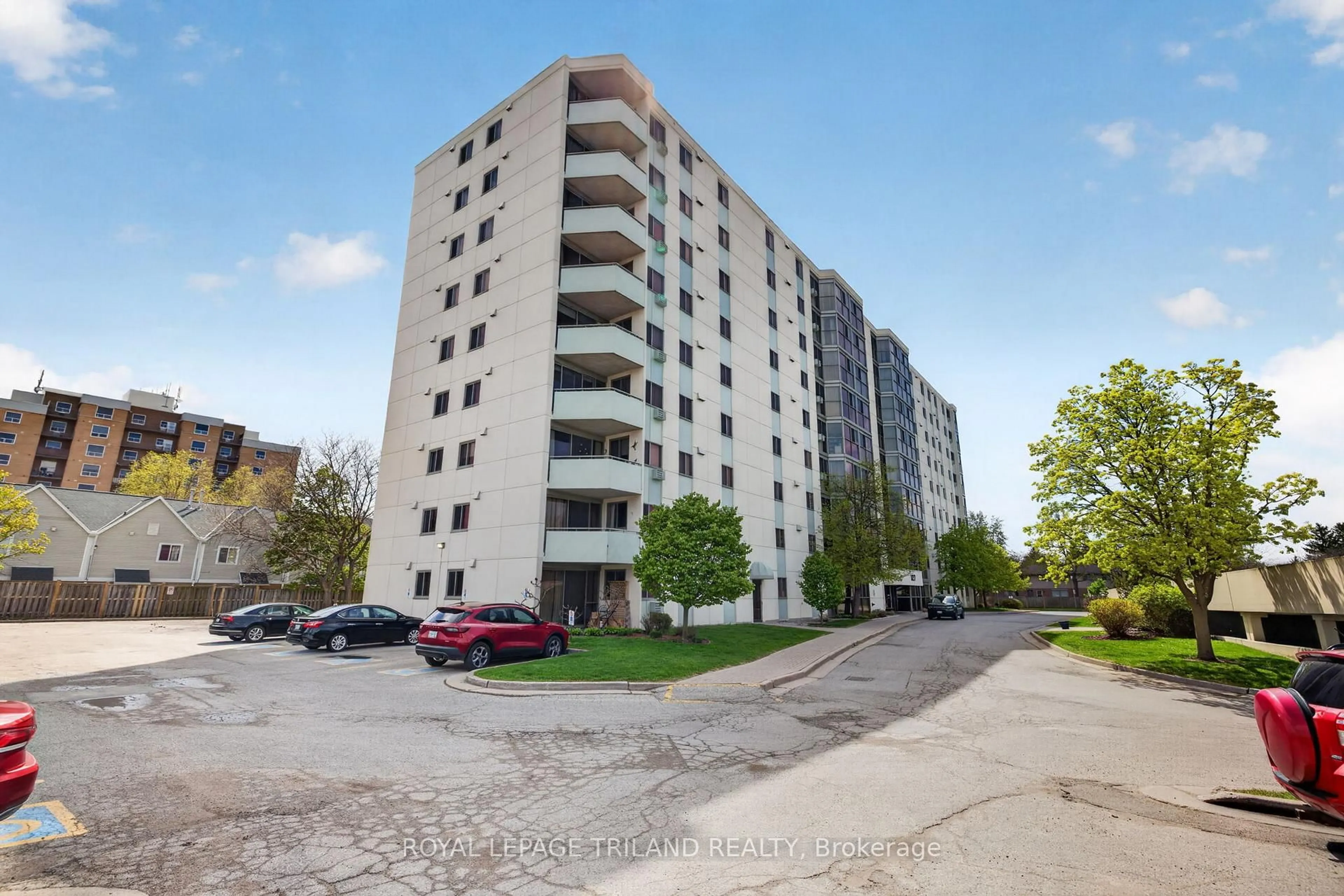 A pic from outside/outdoor area/front of a property/back of a property/a pic from drone, street for 127 Belmont Dr #810, London South Ontario N6J 4J7