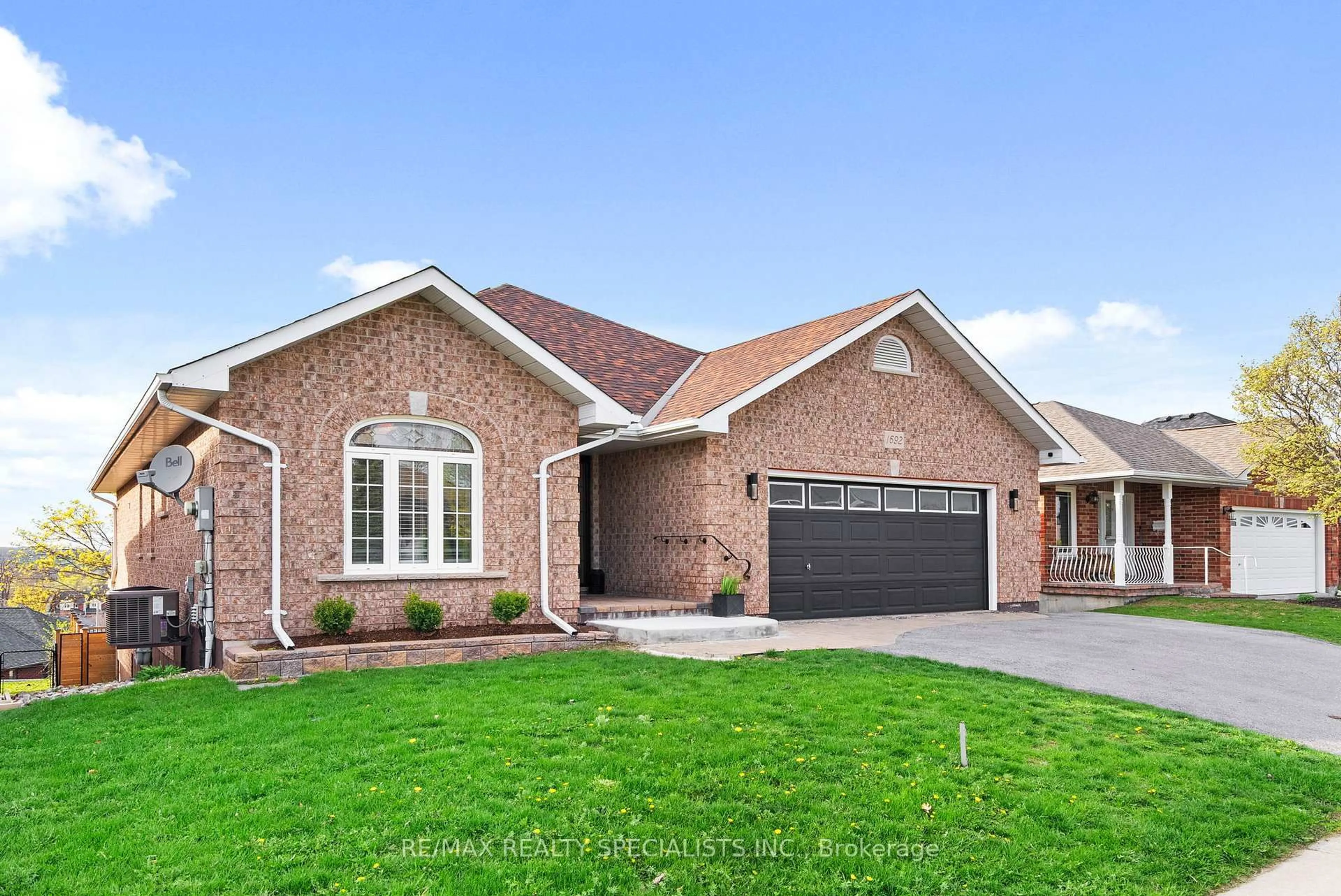 Home with brick exterior material, street for 1692 Glenforest Blvd, Peterborough Ontario K9K 2L5