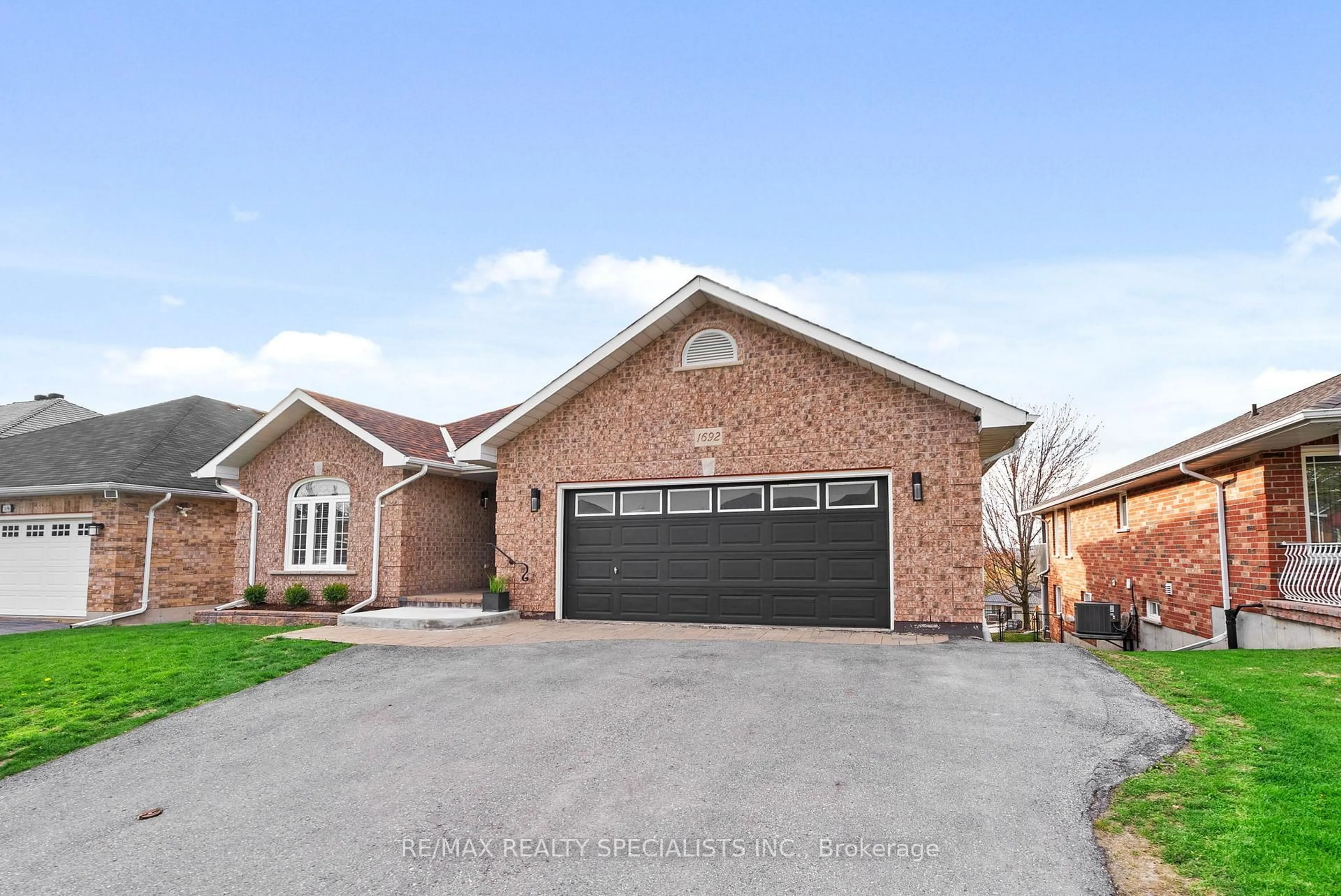 Home with brick exterior material, street for 1692 Glenforest Blvd, Peterborough Ontario K9K 2L5