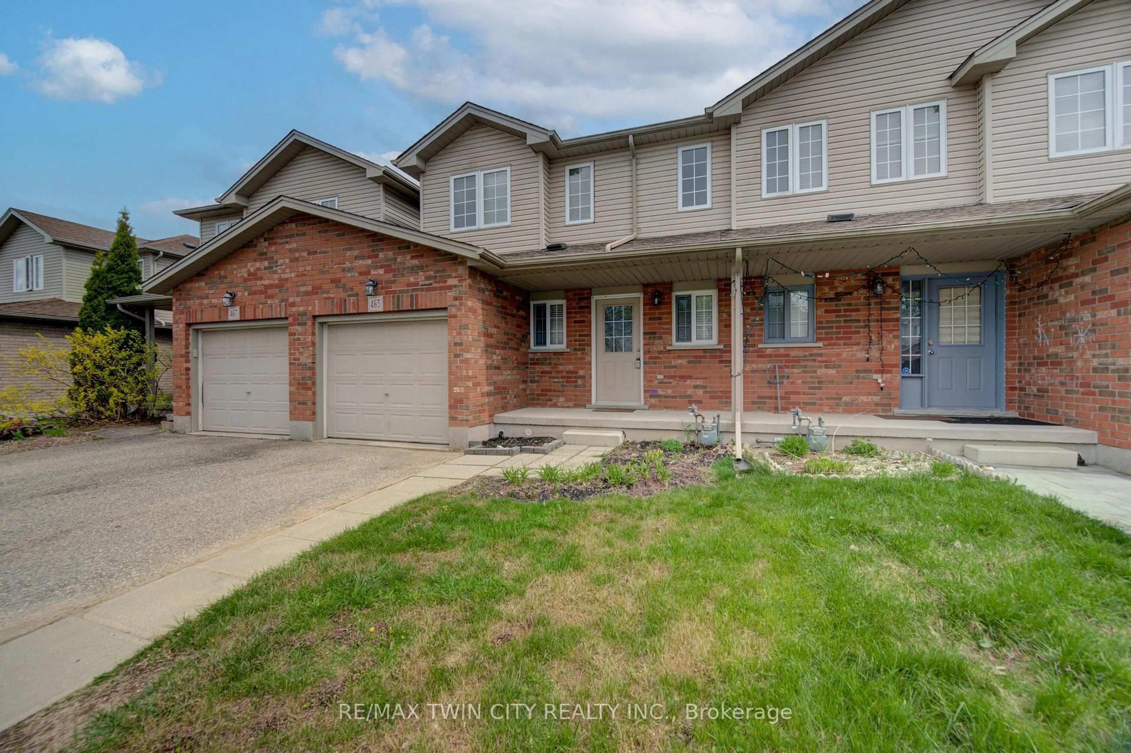 Home with brick exterior material, street for 465 Colt St, Waterloo Ontario N2K 4N8