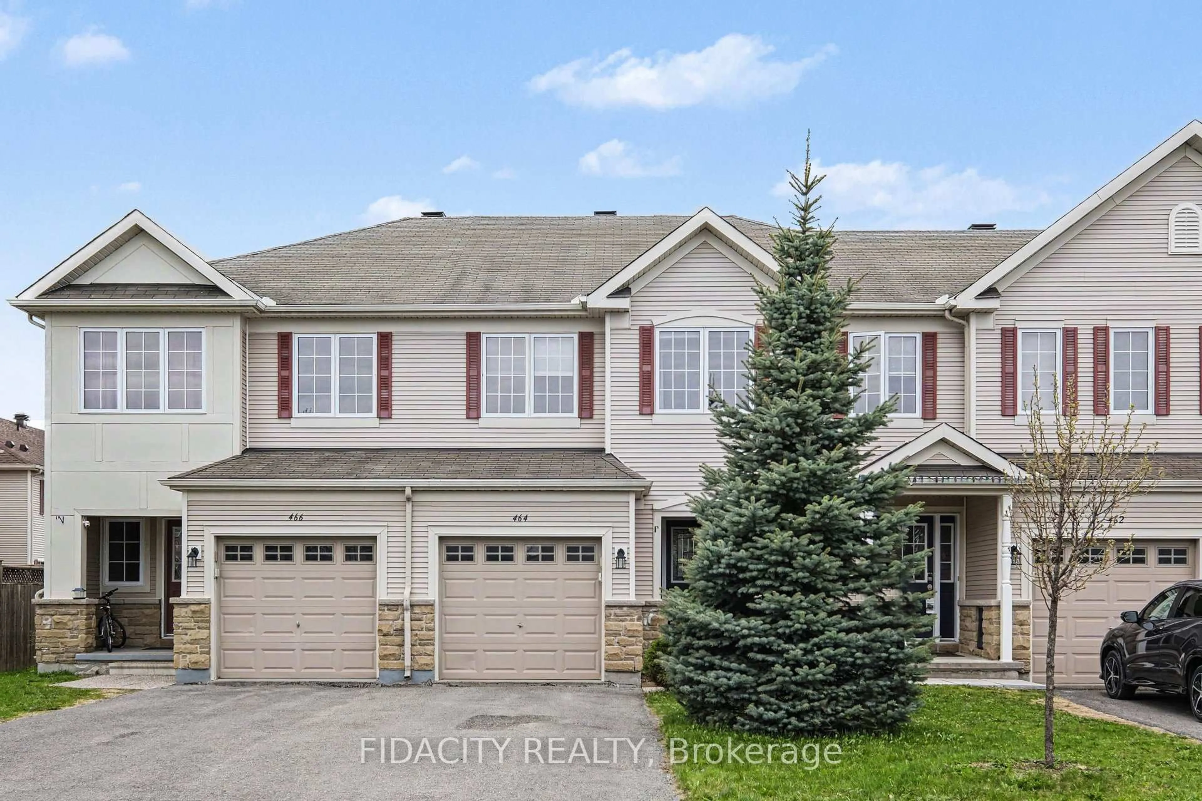 A pic from outside/outdoor area/front of a property/back of a property/a pic from drone, street for 464 Templeford Ave, Ottawa Ontario K2M 0B8