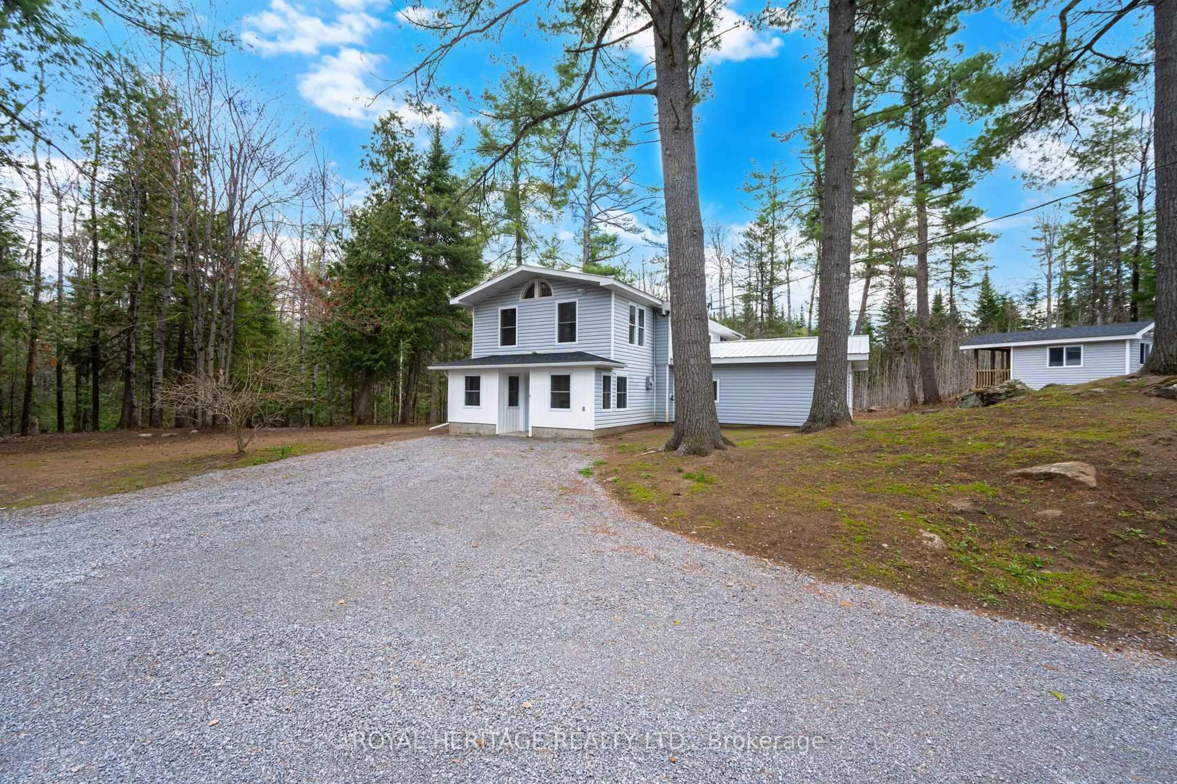 A pic from outside/outdoor area/front of a property/back of a property/a pic from drone, unknown for 7385 Hwy 28, North Kawartha Ontario K0L 1A0