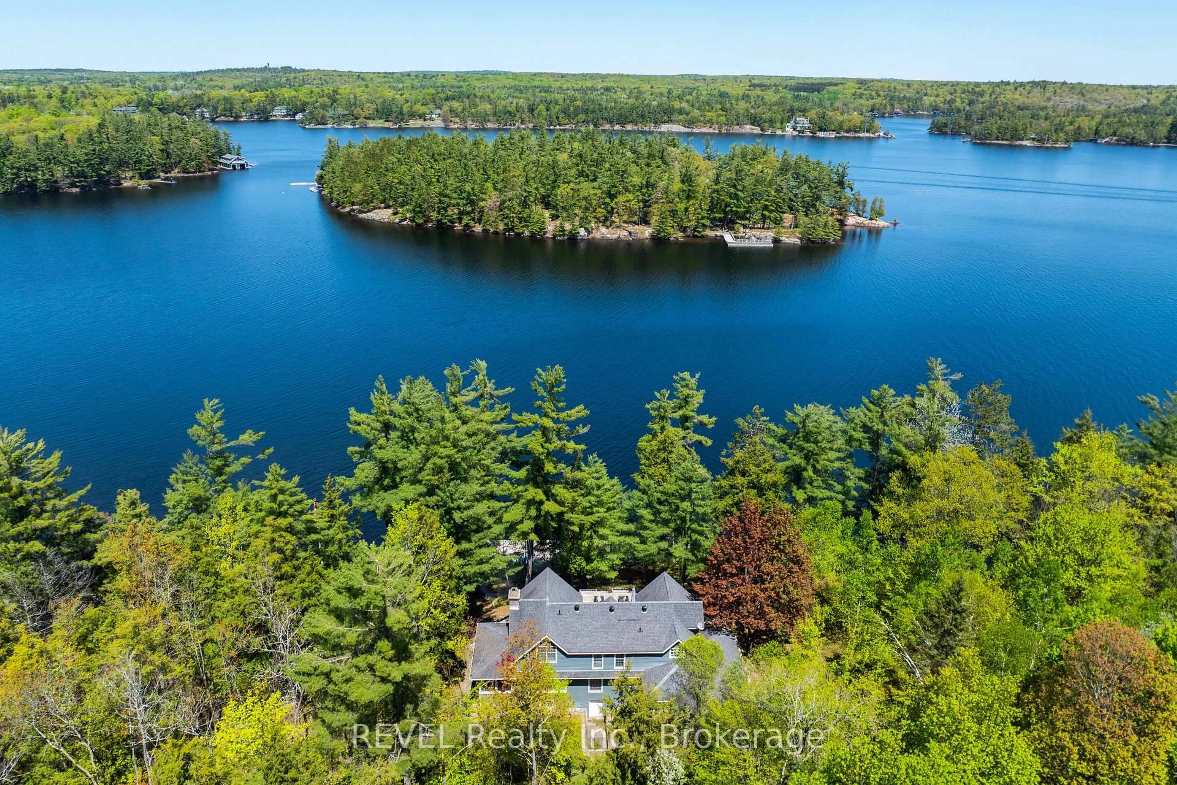 A pic from outside/outdoor area/front of a property/back of a property/a pic from drone, water/lake/river/ocean view for 14-M72 Grandview Island, Muskoka Lakes Ontario P0G 1E0