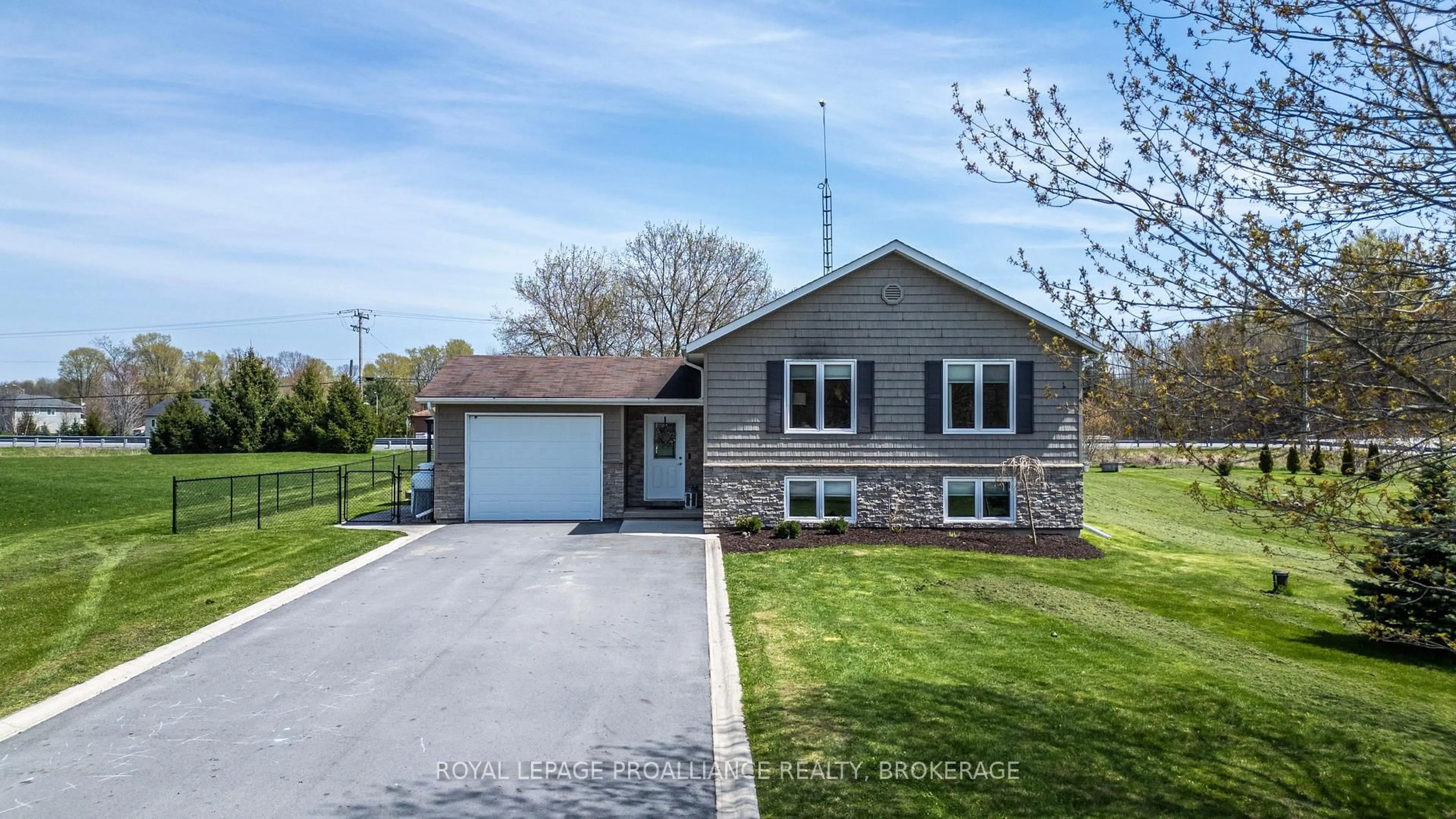 Home with vinyl exterior material, street for 4153 Mangan Blvd, Seeley's Bay Ontario K0H 2N0