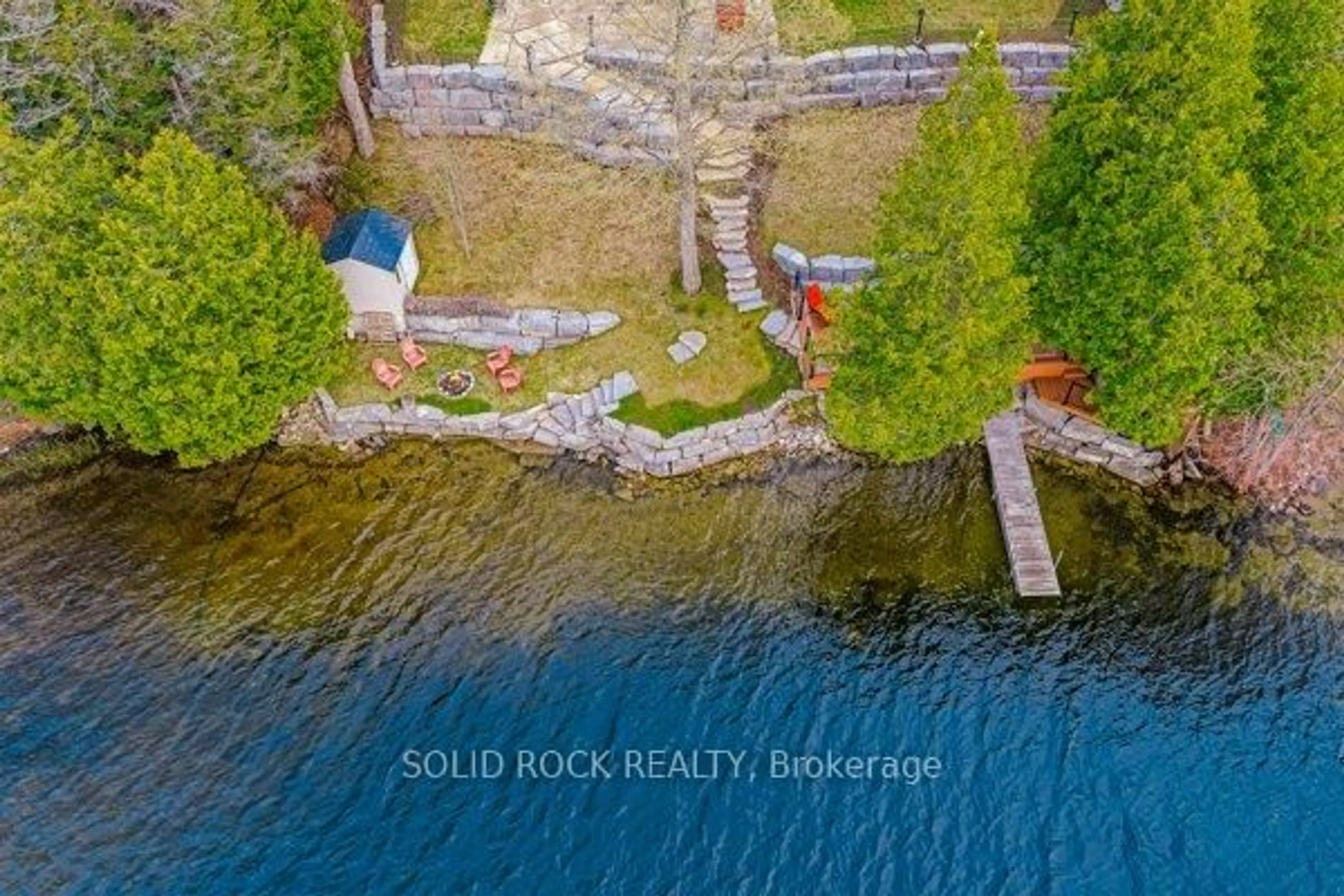 A pic from outside/outdoor area/front of a property/back of a property/a pic from drone, water/lake/river/ocean view for 14 Lower Lake Lane, Godfrey Ontario K0H 1T0