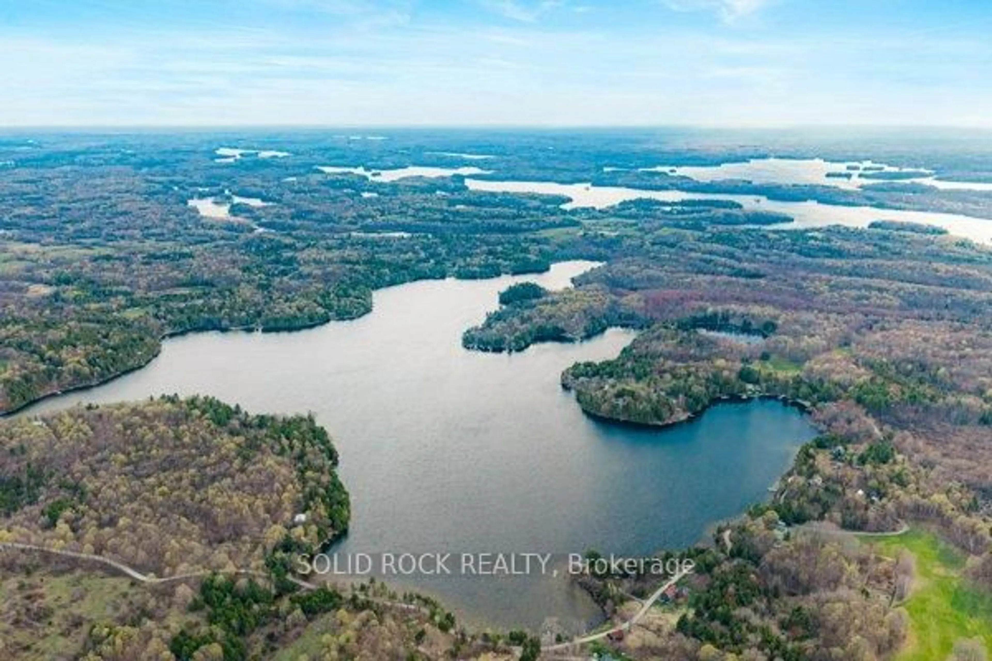A pic from outside/outdoor area/front of a property/back of a property/a pic from drone, water/lake/river/ocean view for 14 Lower Lake Lane, Godfrey Ontario K0H 1T0