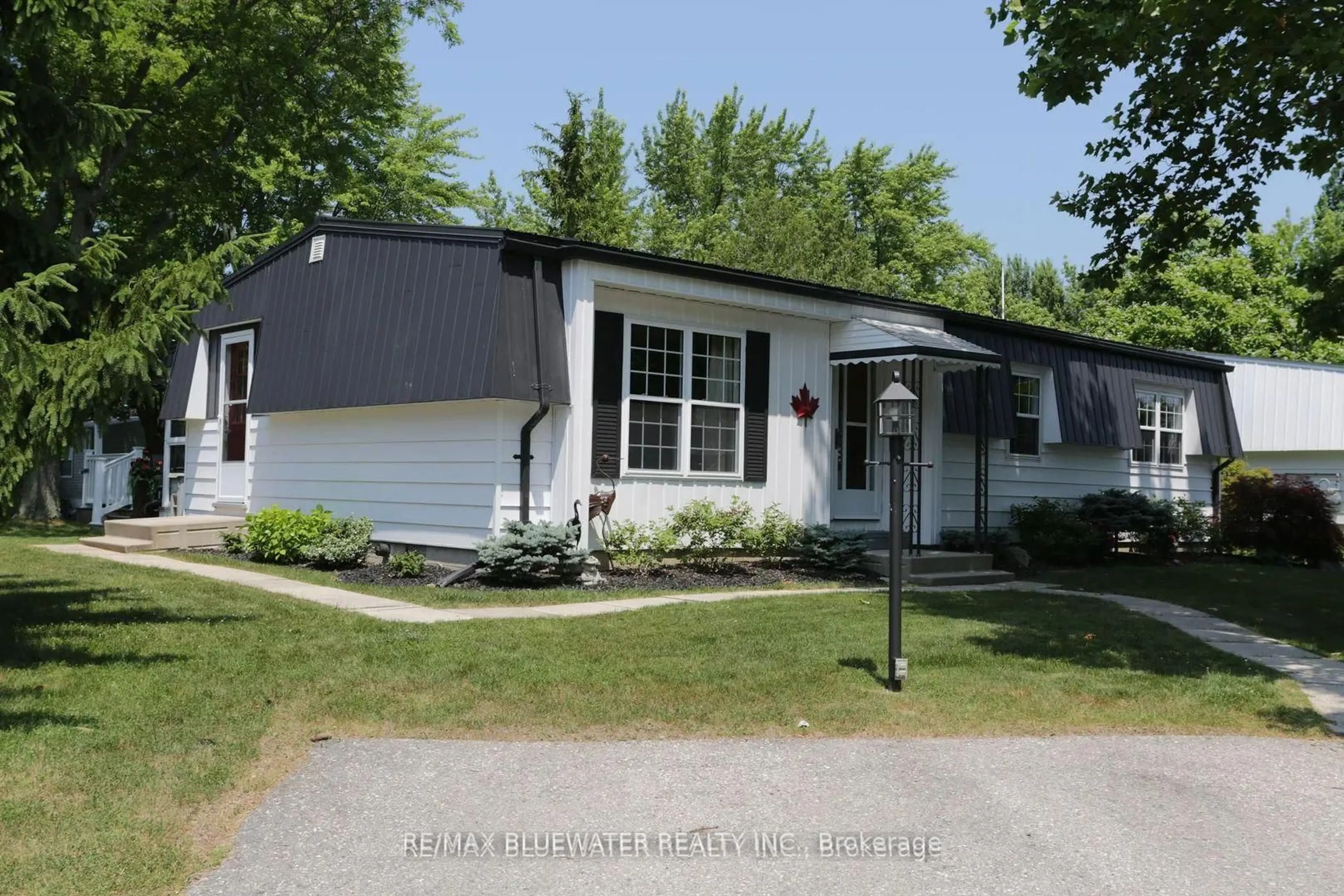 Home with vinyl exterior material, street for 314 Wyldwood Lane, South Huron Ontario N0M 1T0