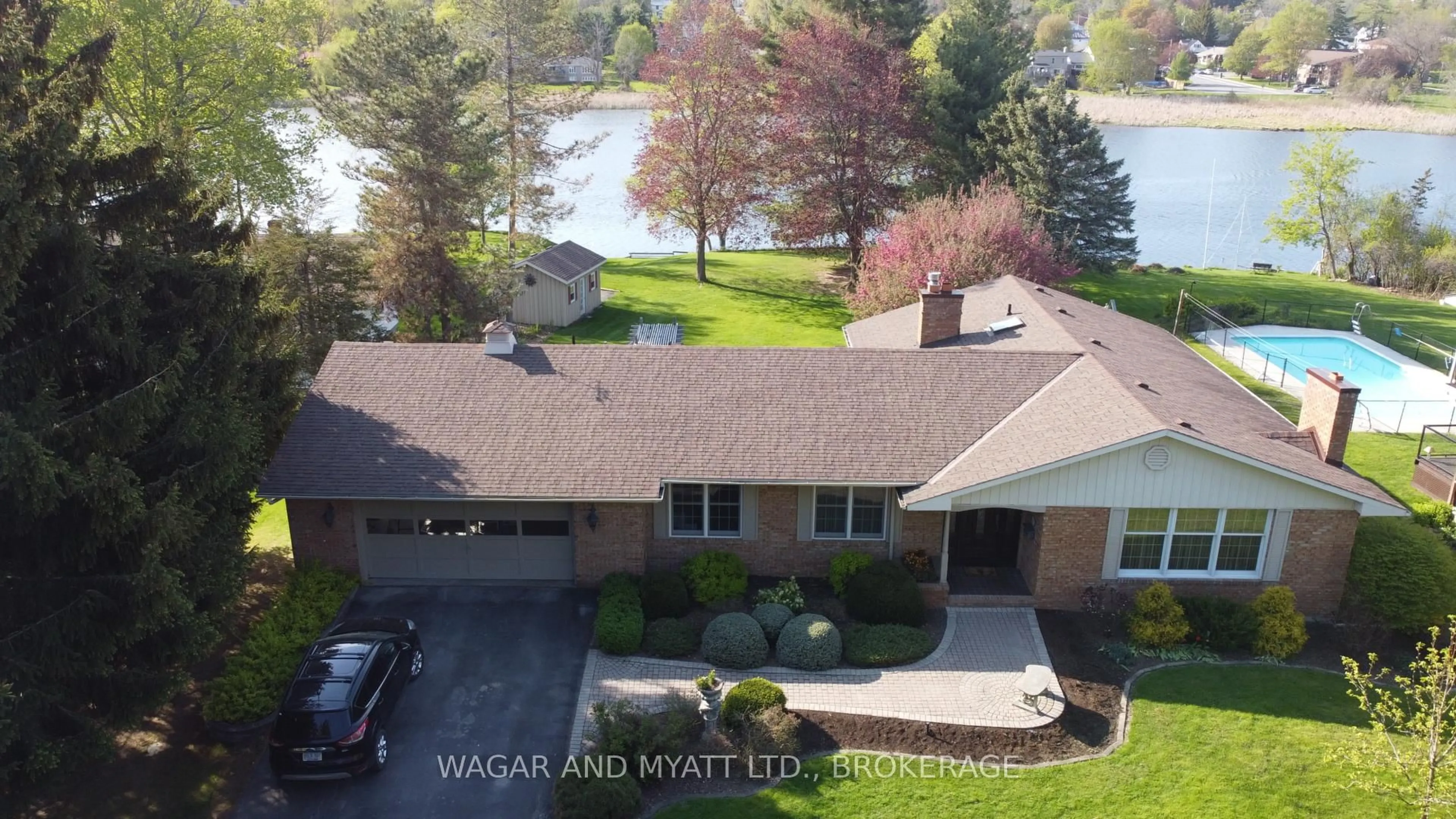 A pic from outside/outdoor area/front of a property/back of a property/a pic from drone, water/lake/river/ocean view for 99 River Rd, Greater Napanee Ontario K7R 3H3