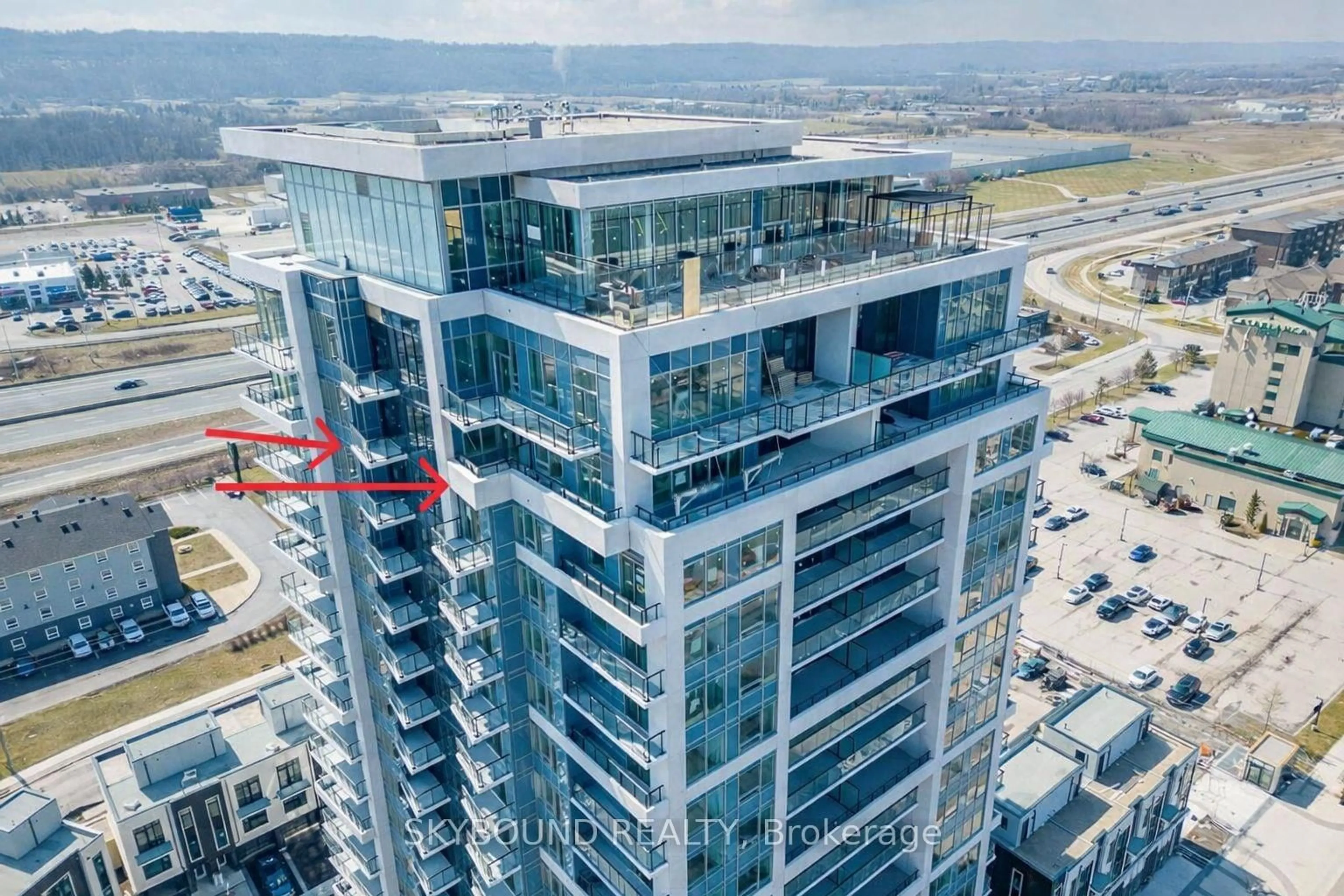 A pic from outside/outdoor area/front of a property/back of a property/a pic from drone, building for 385 Winston Rd #LPH 06, Grimsby Ontario L3M 0J3