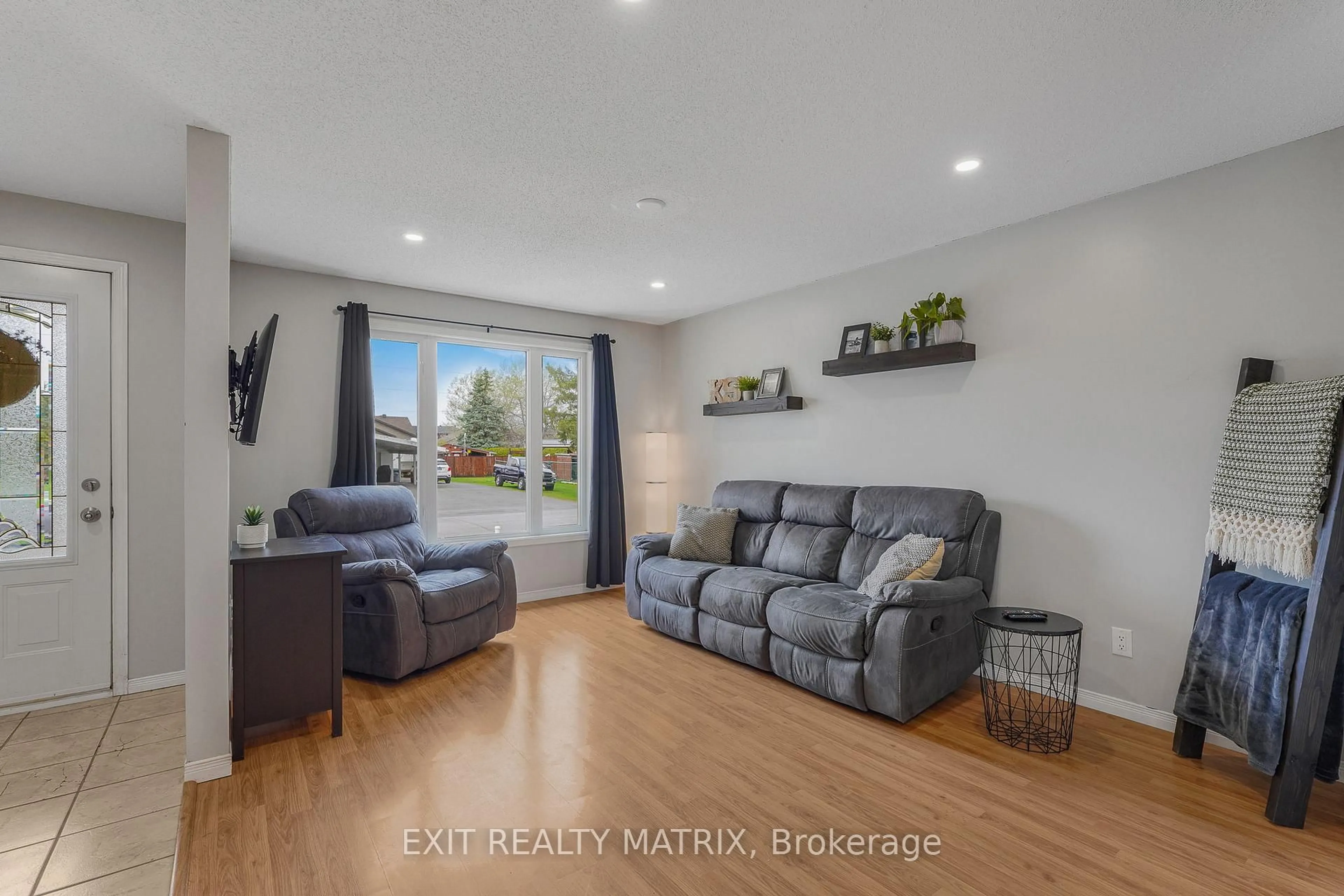 Living room with furniture, wood/laminate floor for 2 Gloss St #B, North Stormont Ontario K0A 1R0