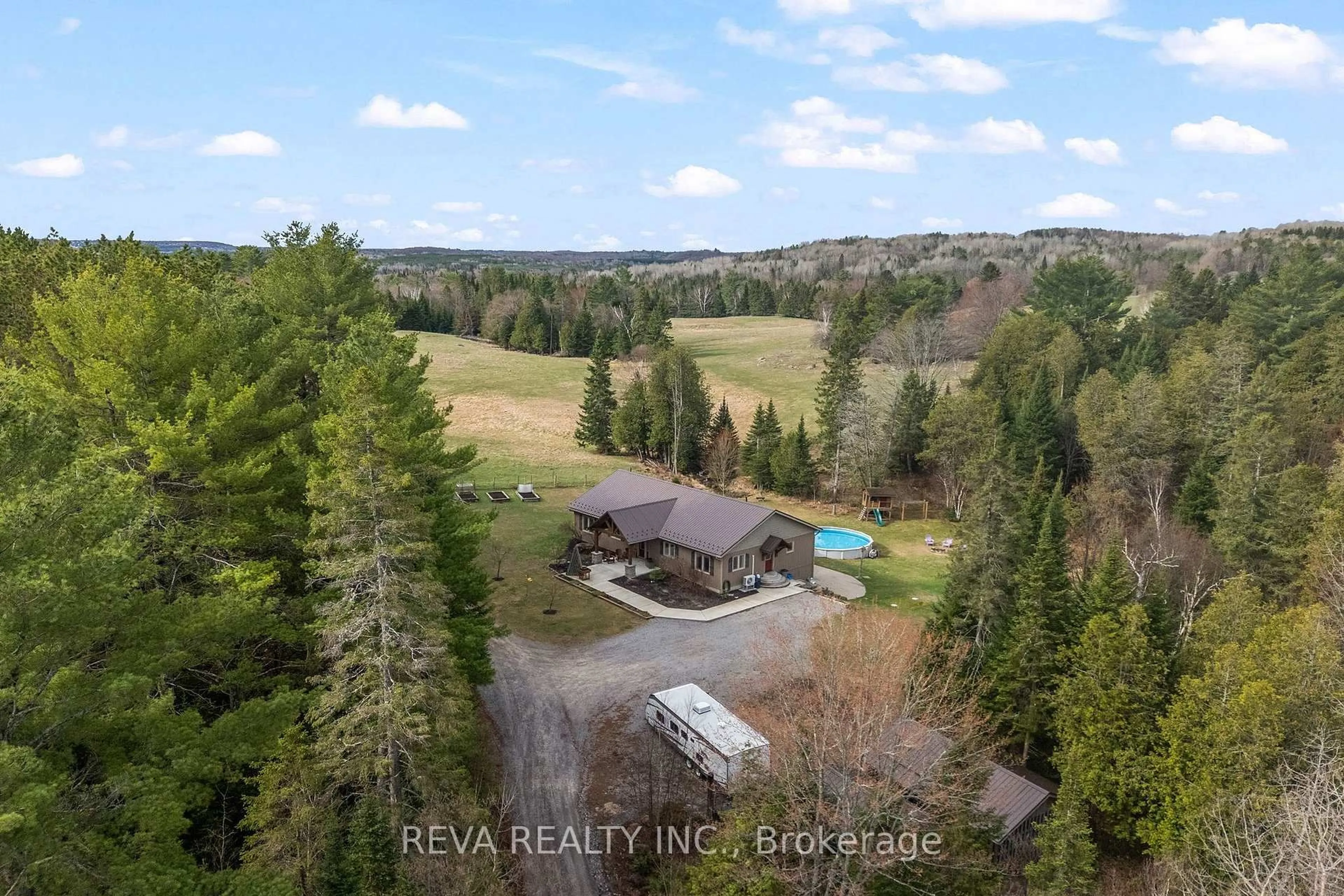 A pic from outside/outdoor area/front of a property/back of a property/a pic from drone, water/lake/river/ocean view for 32178 Highway 28, Bancroft Ontario K0L 1C0