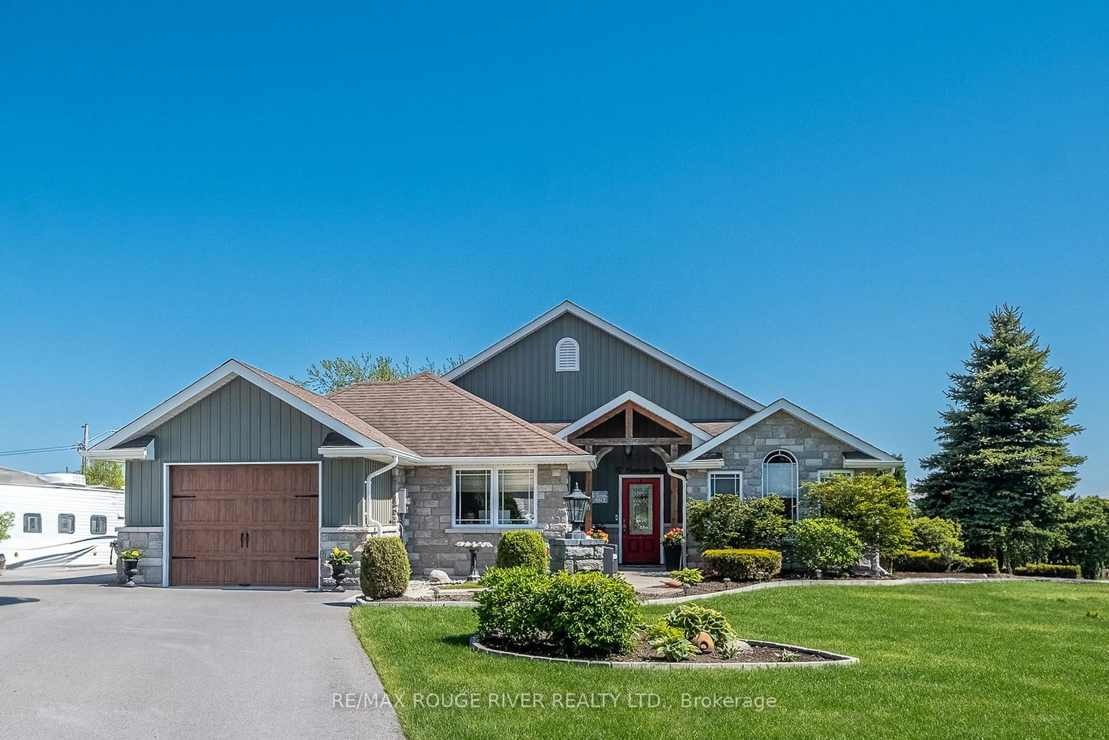 Home with vinyl exterior material, street for 57 Harbour St, Brighton Ontario K0K 1H0
