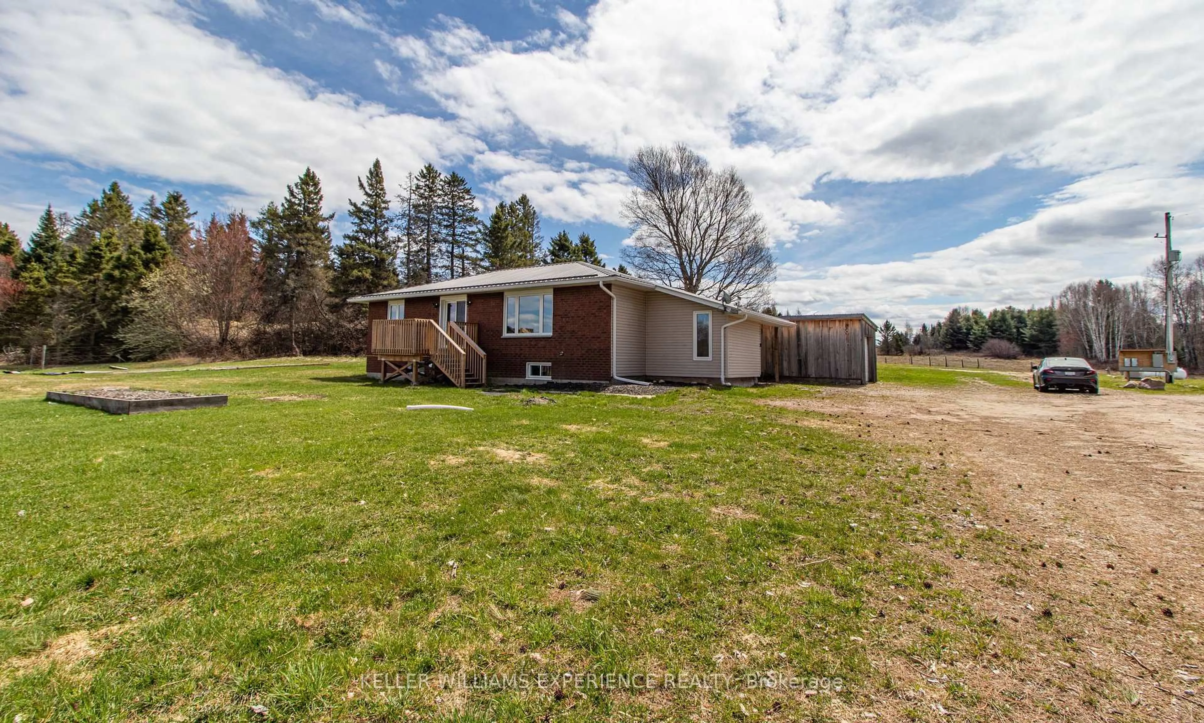 A pic from outside/outdoor area/front of a property/back of a property/a pic from drone, unknown for 744 Trunk Rd, Bonfield Ontario P0H 2E0
