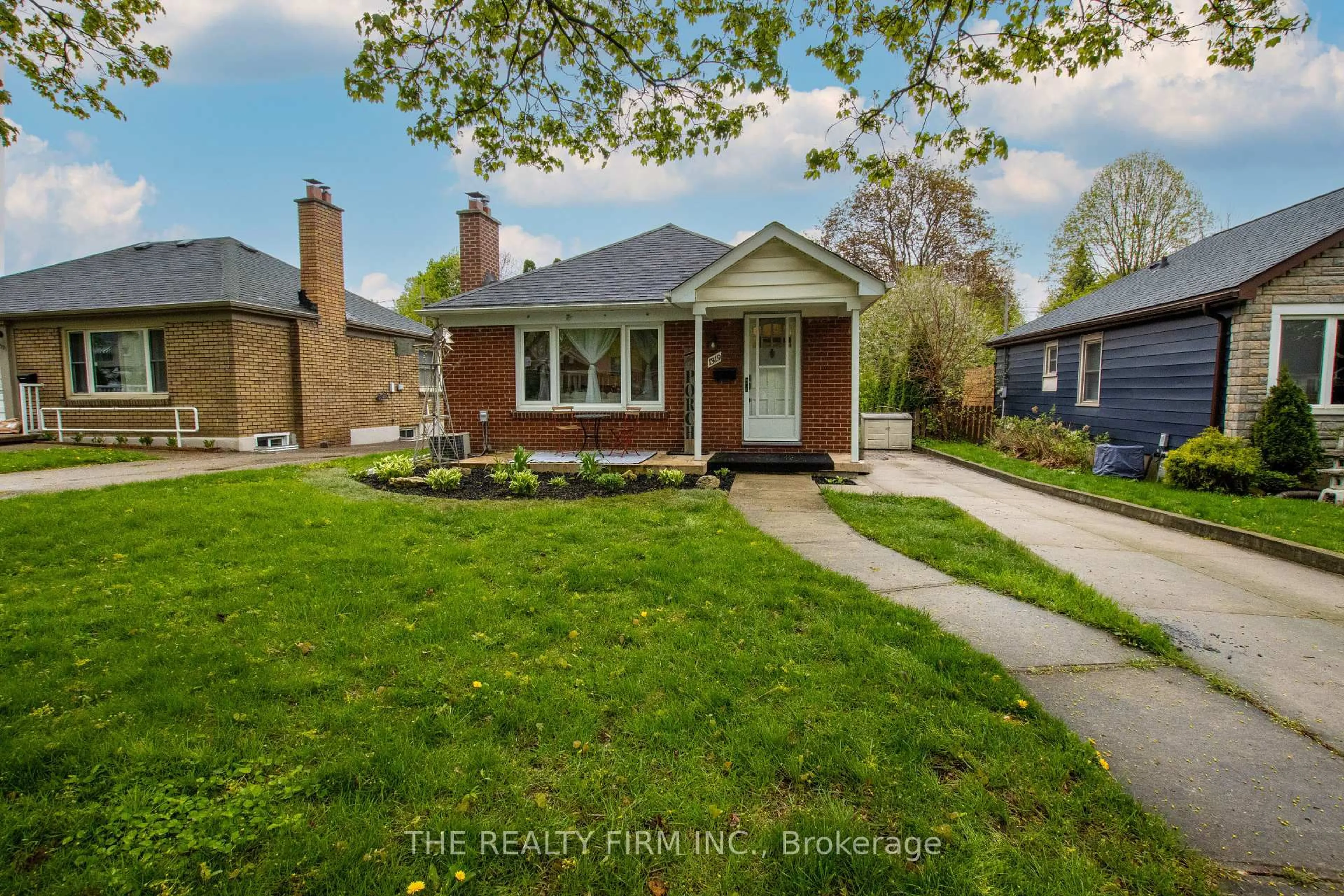 Home with brick exterior material, street for 1319 Wilton Ave, London East Ontario N5W 2H5