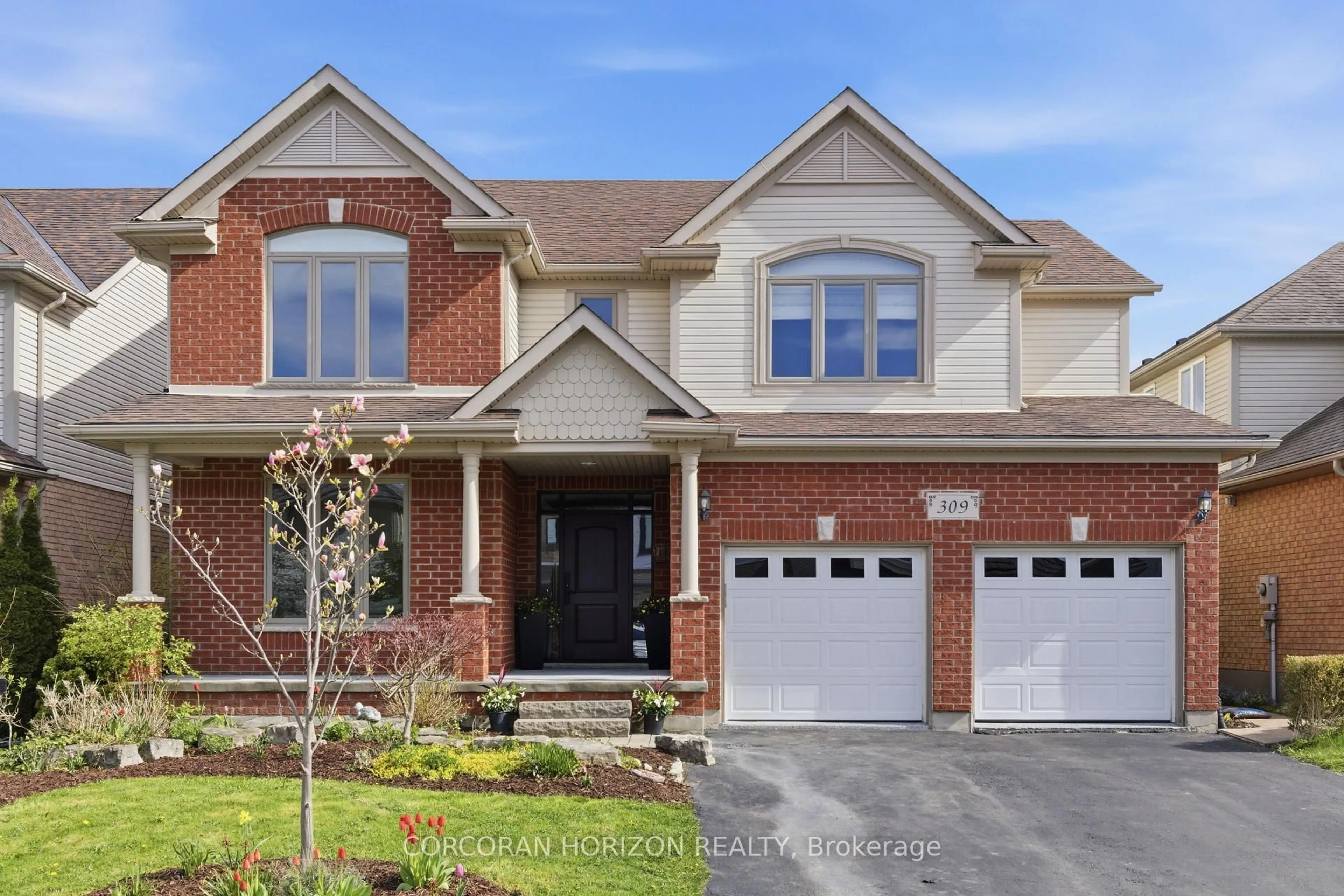 Home with brick exterior material, street for 309 Schooner Cres, Waterloo Ontario N2K 4M5