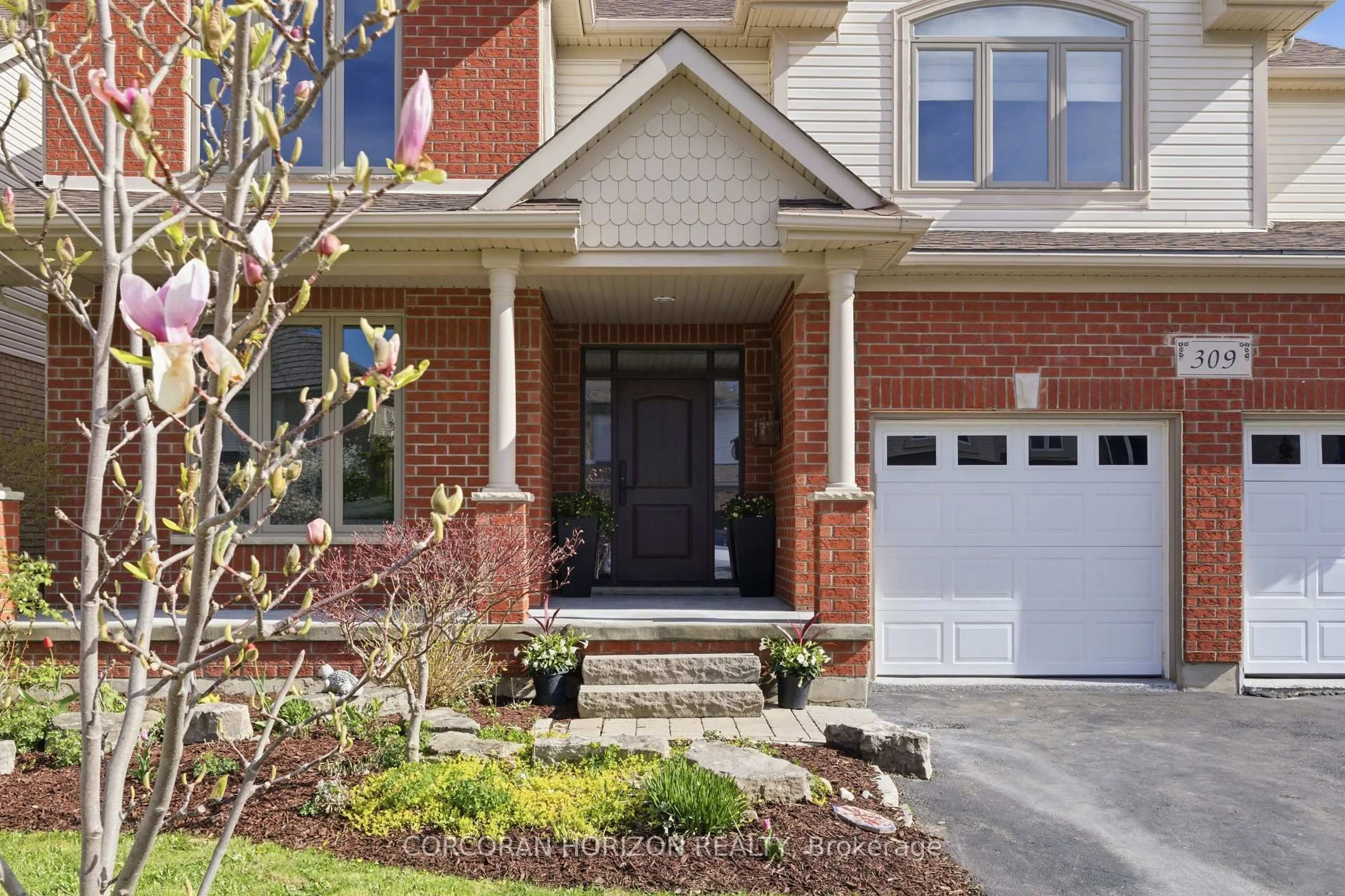Home with brick exterior material, street for 309 Schooner Cres, Waterloo Ontario N2K 4M5