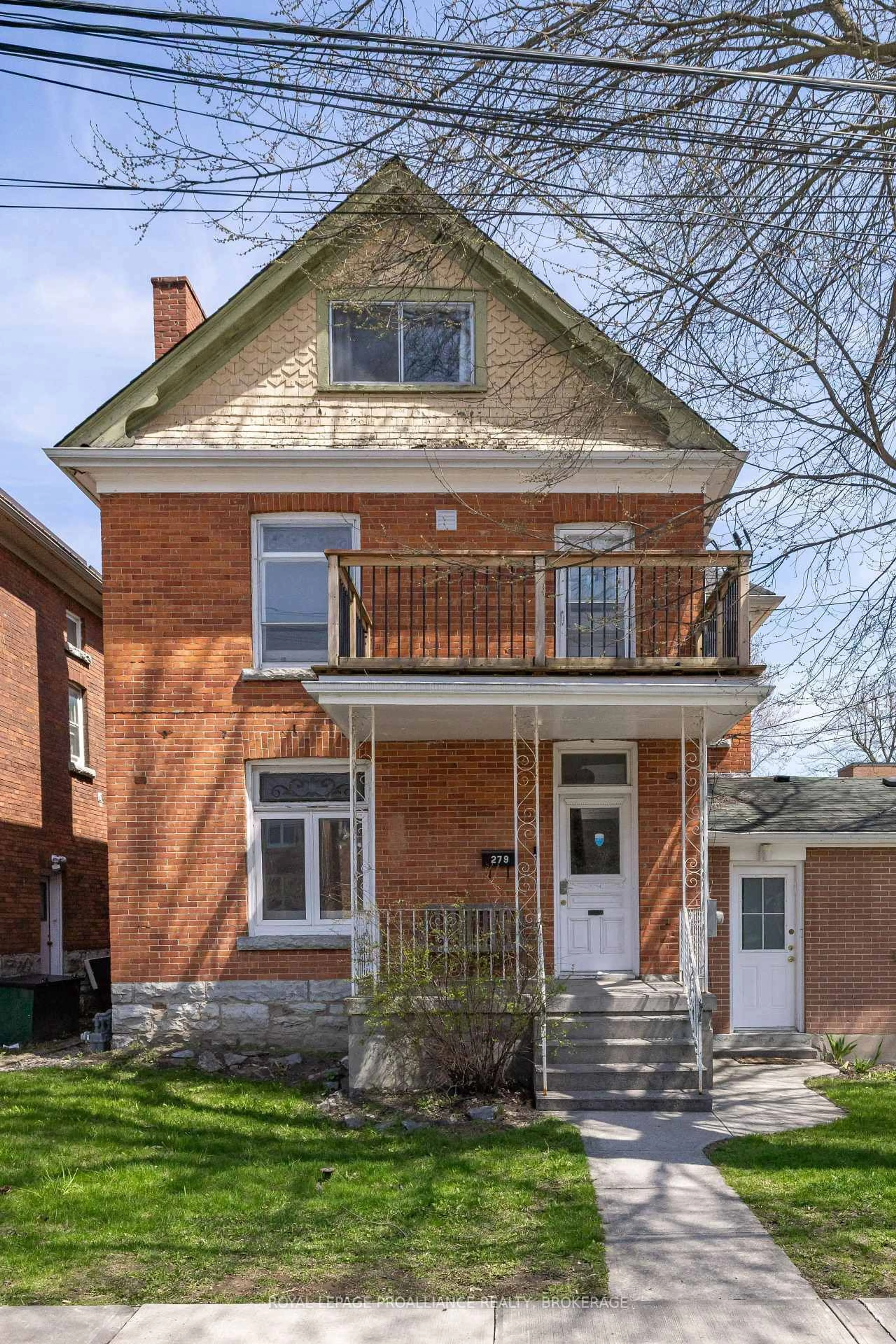 Home with brick exterior material, street for 279 Frontenac St, Kingston Ontario K7L 3S9