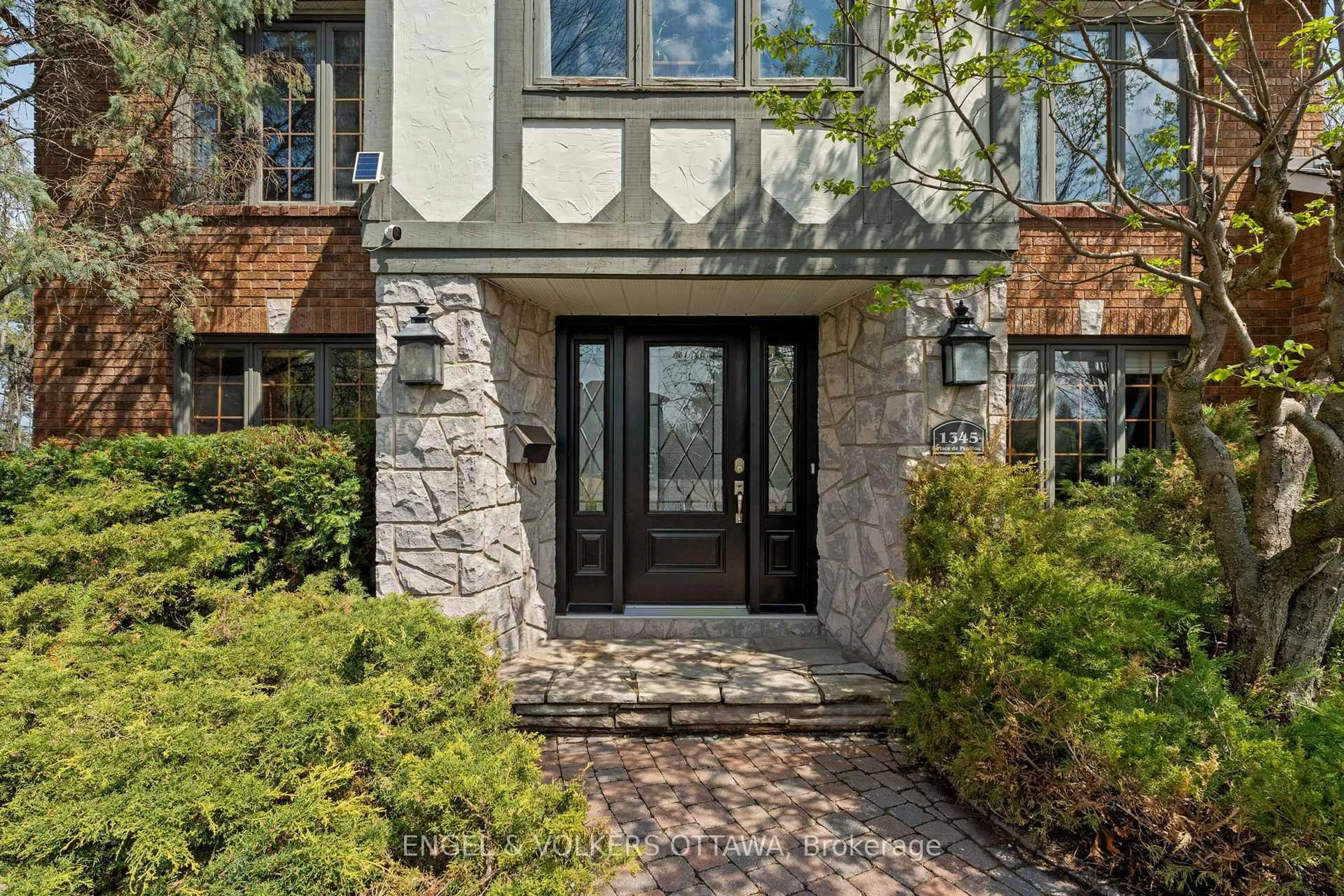 Home with brick exterior material, street for 1345 De Papillon Pl, Orleans Ontario K4A 1Y9
