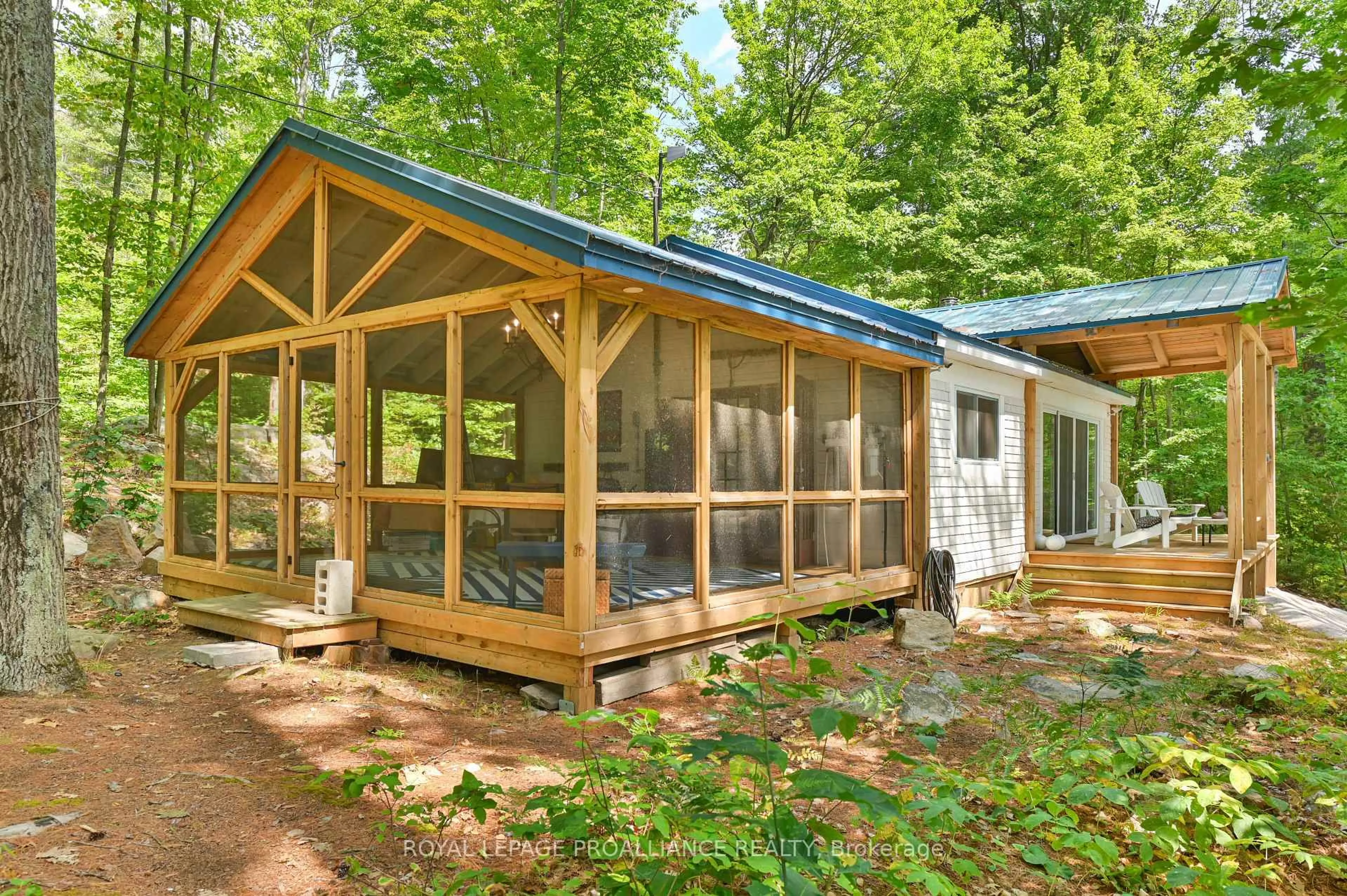 Patio, forest/trees view for 1780 Mazinaw Lake, Cloyne Ontario K0H 1K0