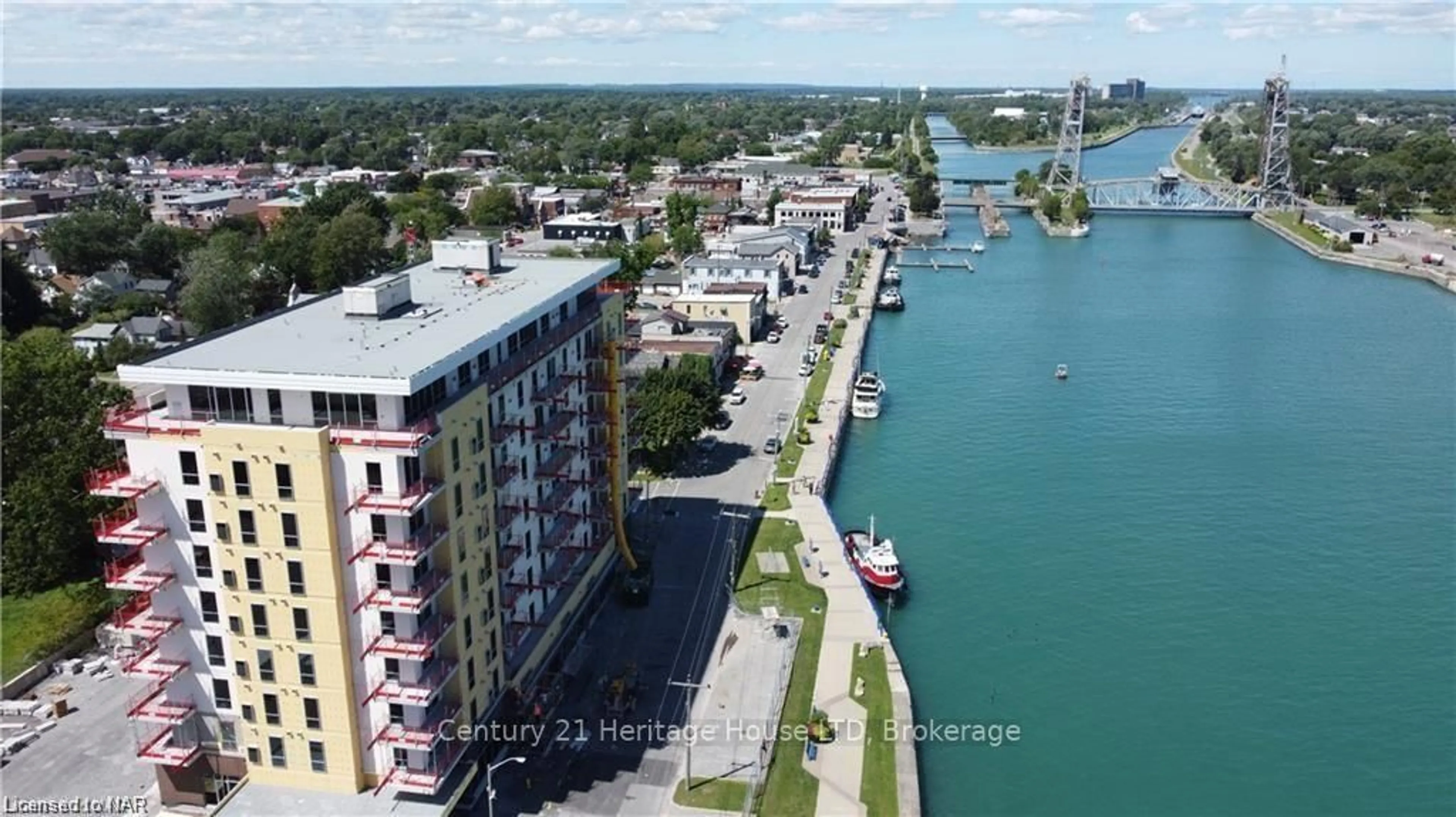 A pic from outside/outdoor area/front of a property/back of a property/a pic from drone, water/lake/river/ocean view for 118 West St #704, Port Colborne Ontario L3K 4E6