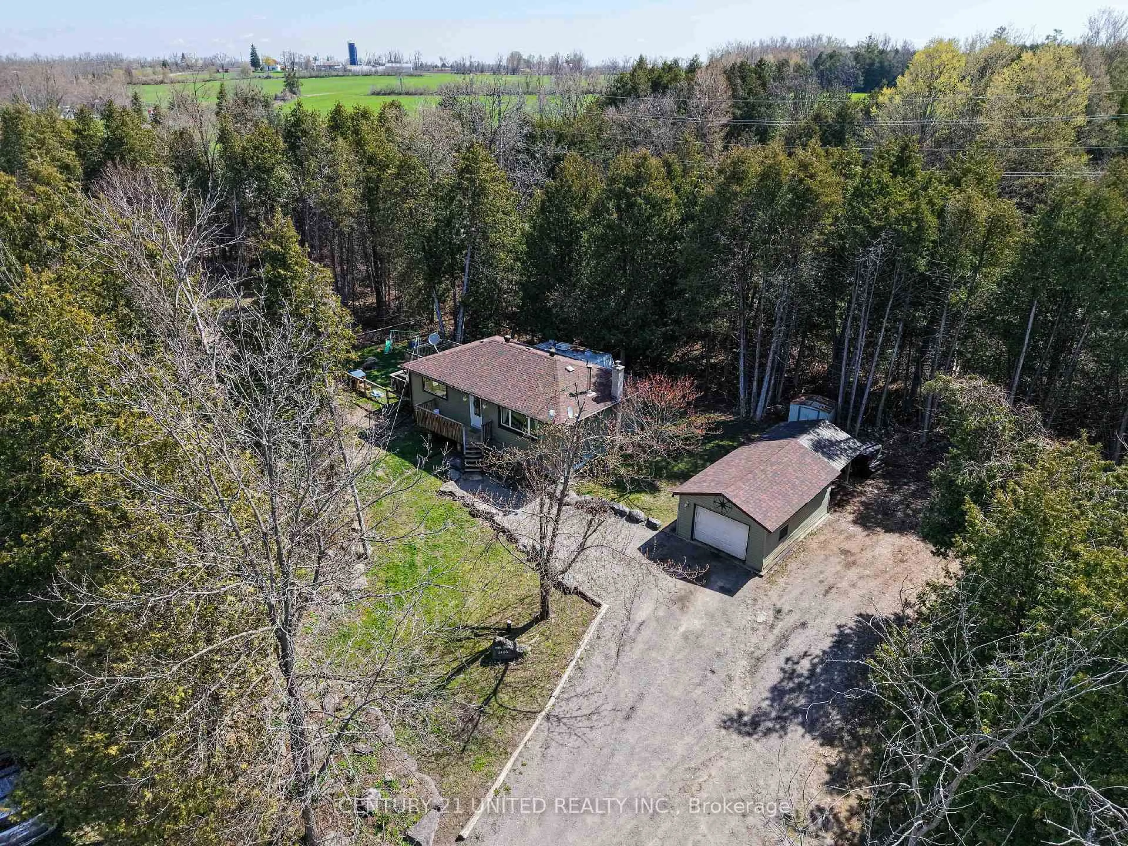 A pic from outside/outdoor area/front of a property/back of a property/a pic from drone, forest/trees view for 2403 Upper Chemong Dr, Selwyn Ontario K0L 2H0