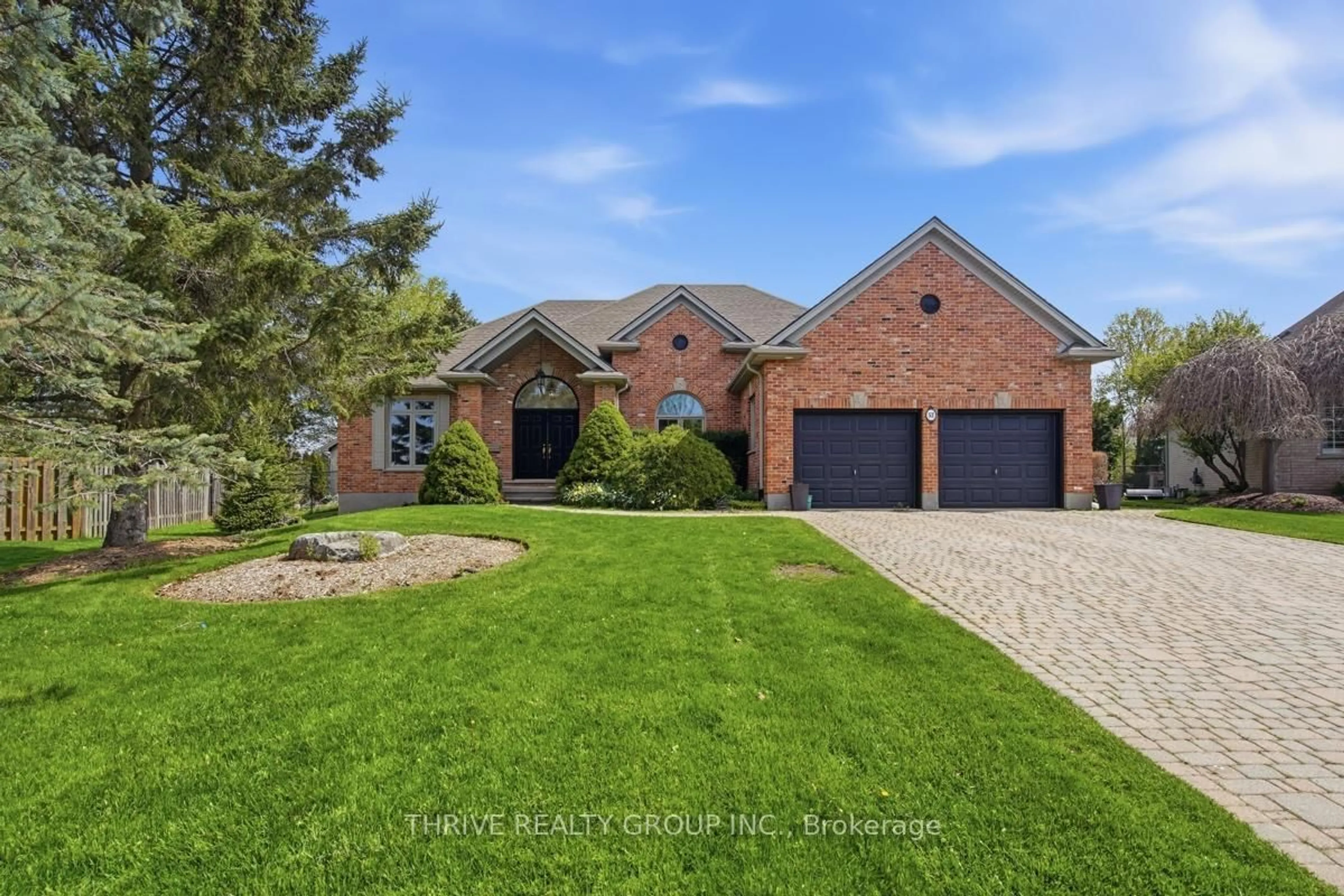 Home with brick exterior material, street for 52 WYNFIELD Lane, Middlesex Centre Ontario N6H 5L2