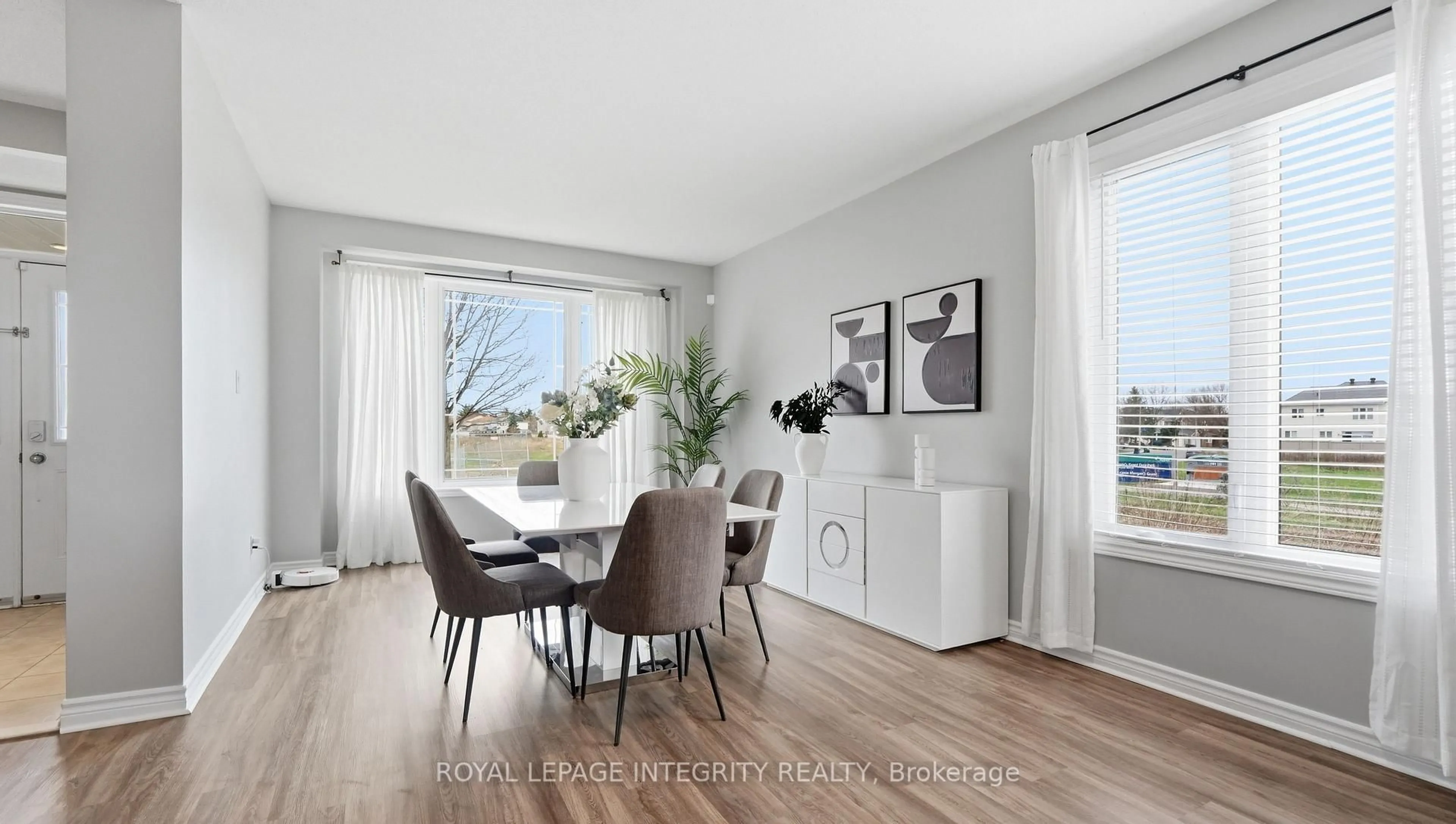 Dining room, wood/laminate floor for 75 Whernside Terr, Ottawa Ontario K2W 0C7