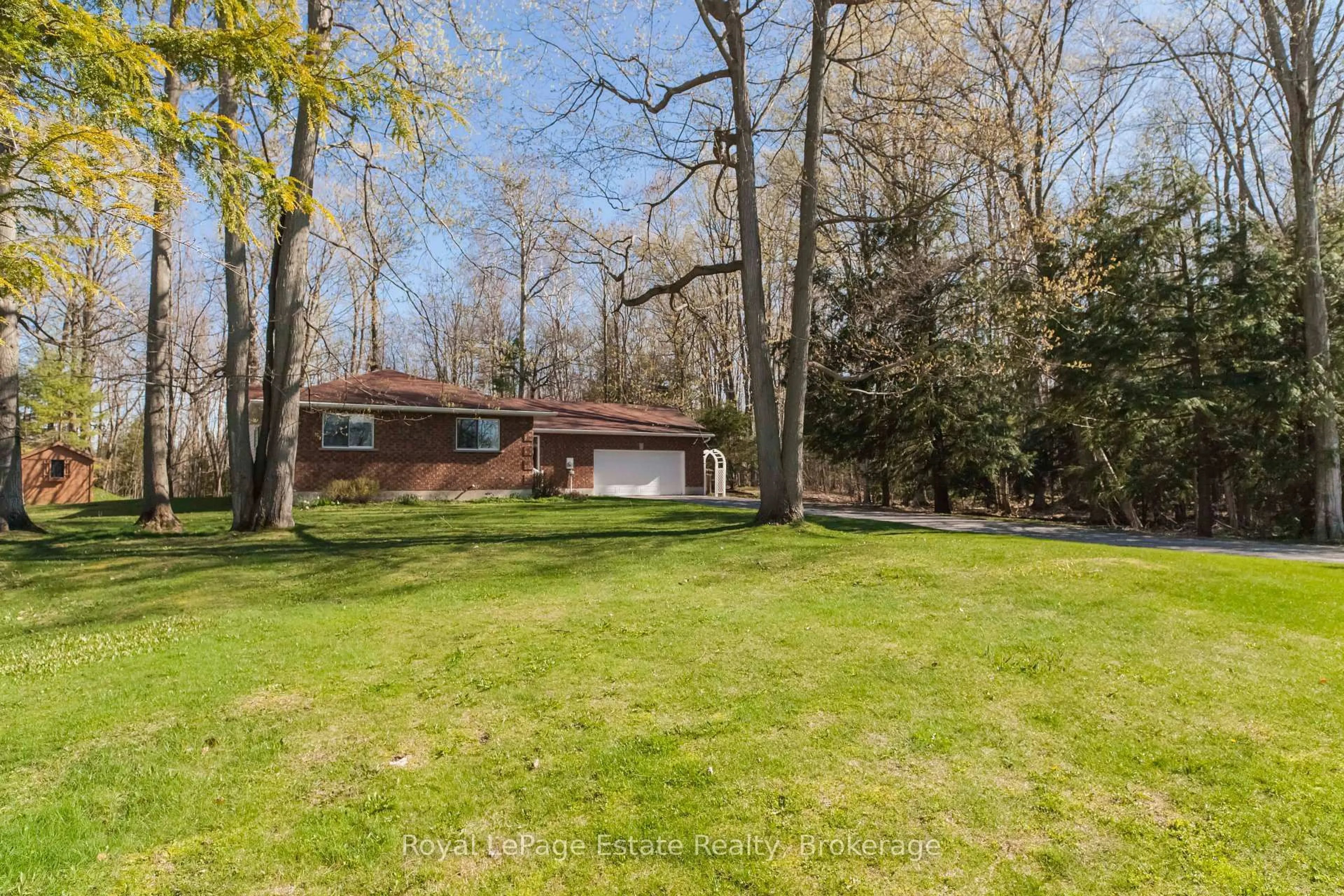 A pic from outside/outdoor area/front of a property/back of a property/a pic from drone, forest/trees view for 58 Graham Cres, South Bruce Peninsula Ontario N0H 2G0