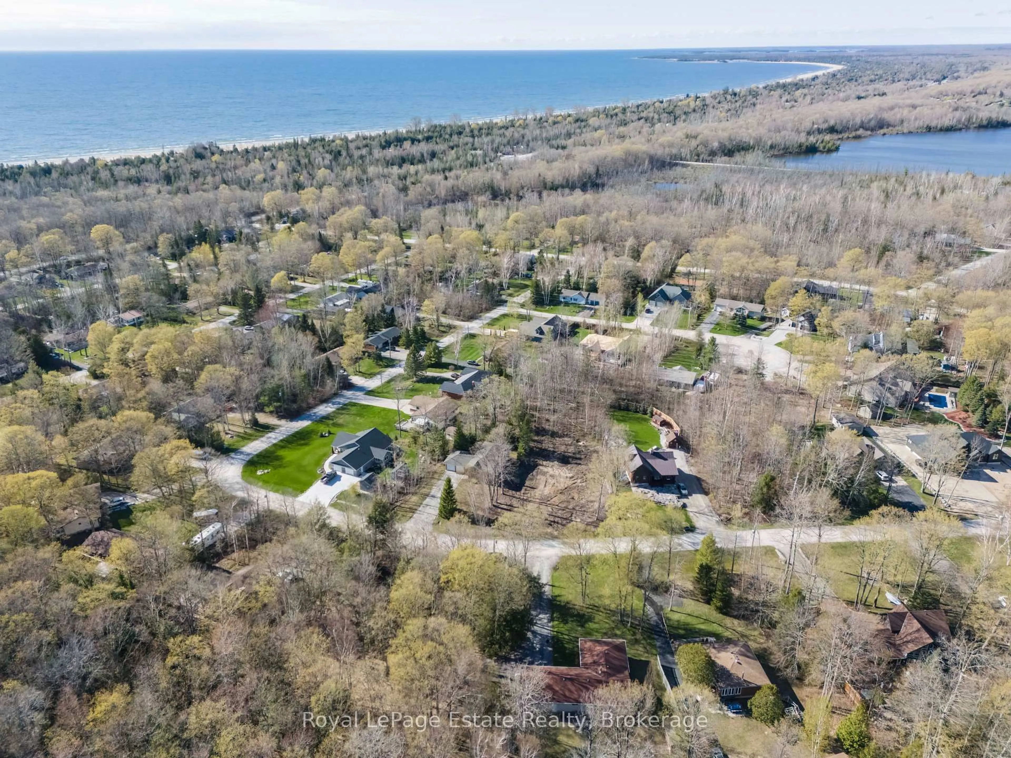 A pic from outside/outdoor area/front of a property/back of a property/a pic from drone, water/lake/river/ocean view for 58 Graham Cres, South Bruce Peninsula Ontario N0H 2G0