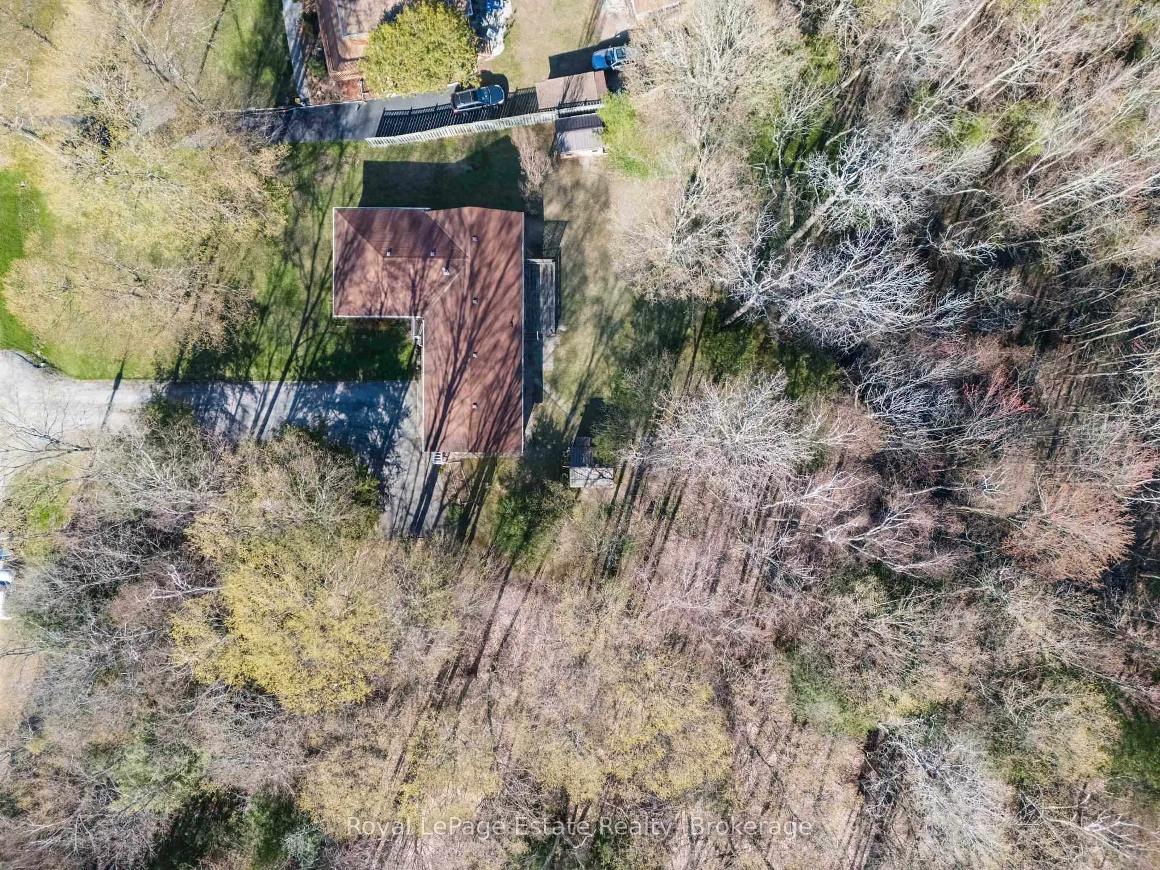 A pic from outside/outdoor area/front of a property/back of a property/a pic from drone, forest/trees view for 58 Graham Cres, South Bruce Peninsula Ontario N0H 2G0