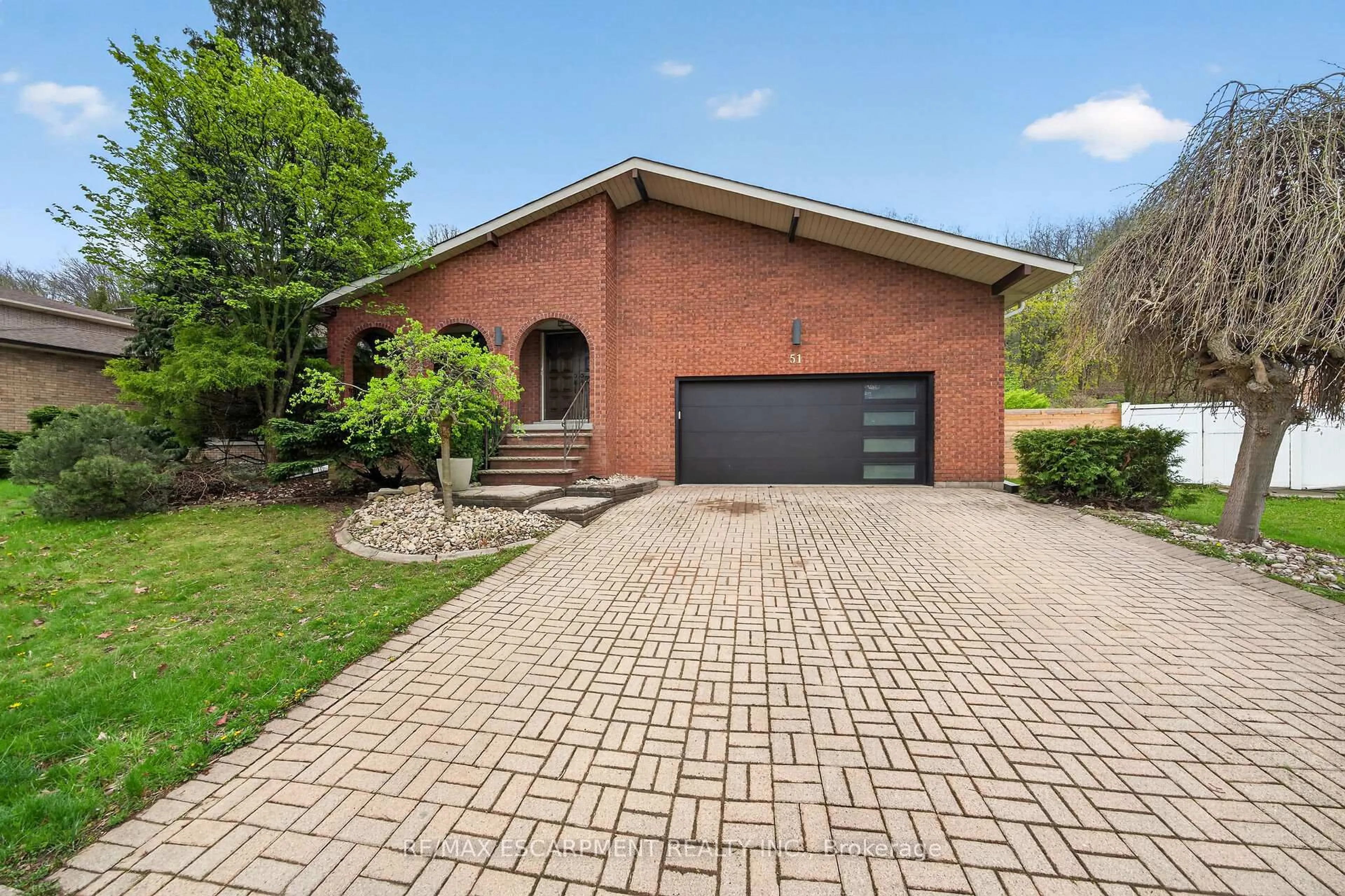 Home with brick exterior material, street for 51 President Dr, Hamilton Ontario L8G 4H2