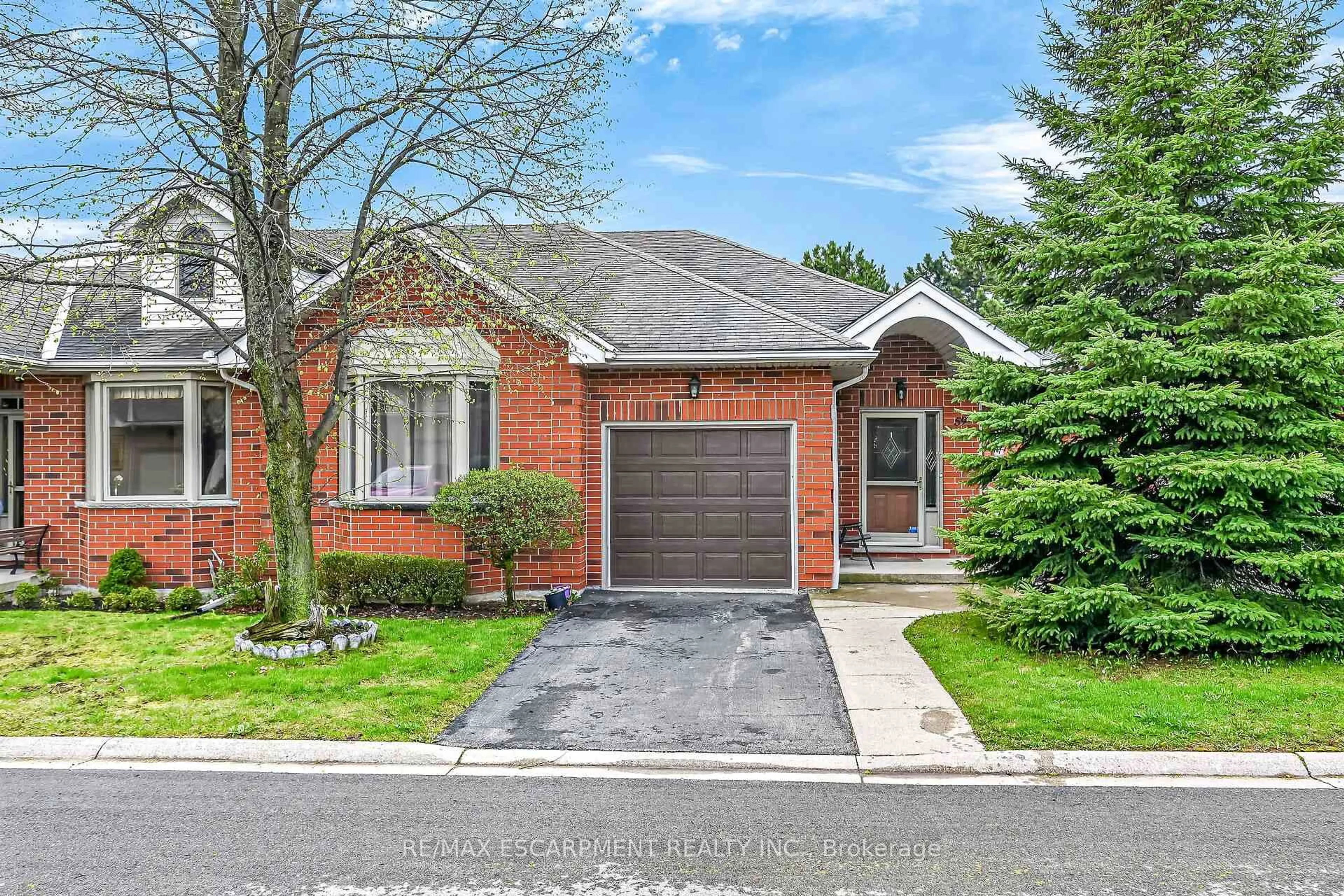 Home with brick exterior material, street for 59 Riveroaks Dr, Hamilton Ontario L0R 1W0