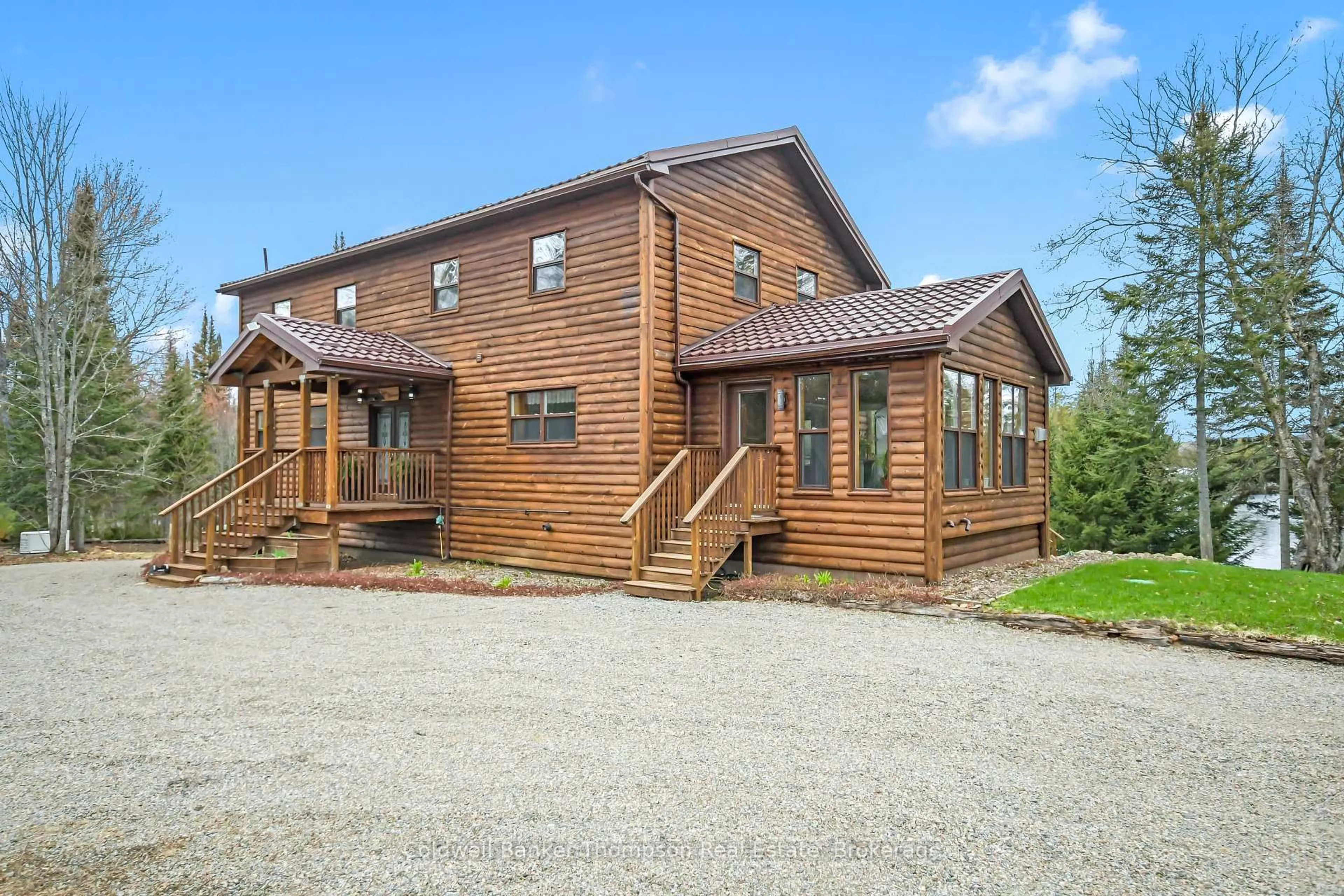 A pic from outside/outdoor area/front of a property/back of a property/a pic from drone, building for 390 Pine Grove Rd, Perry Ontario P0A 1J0