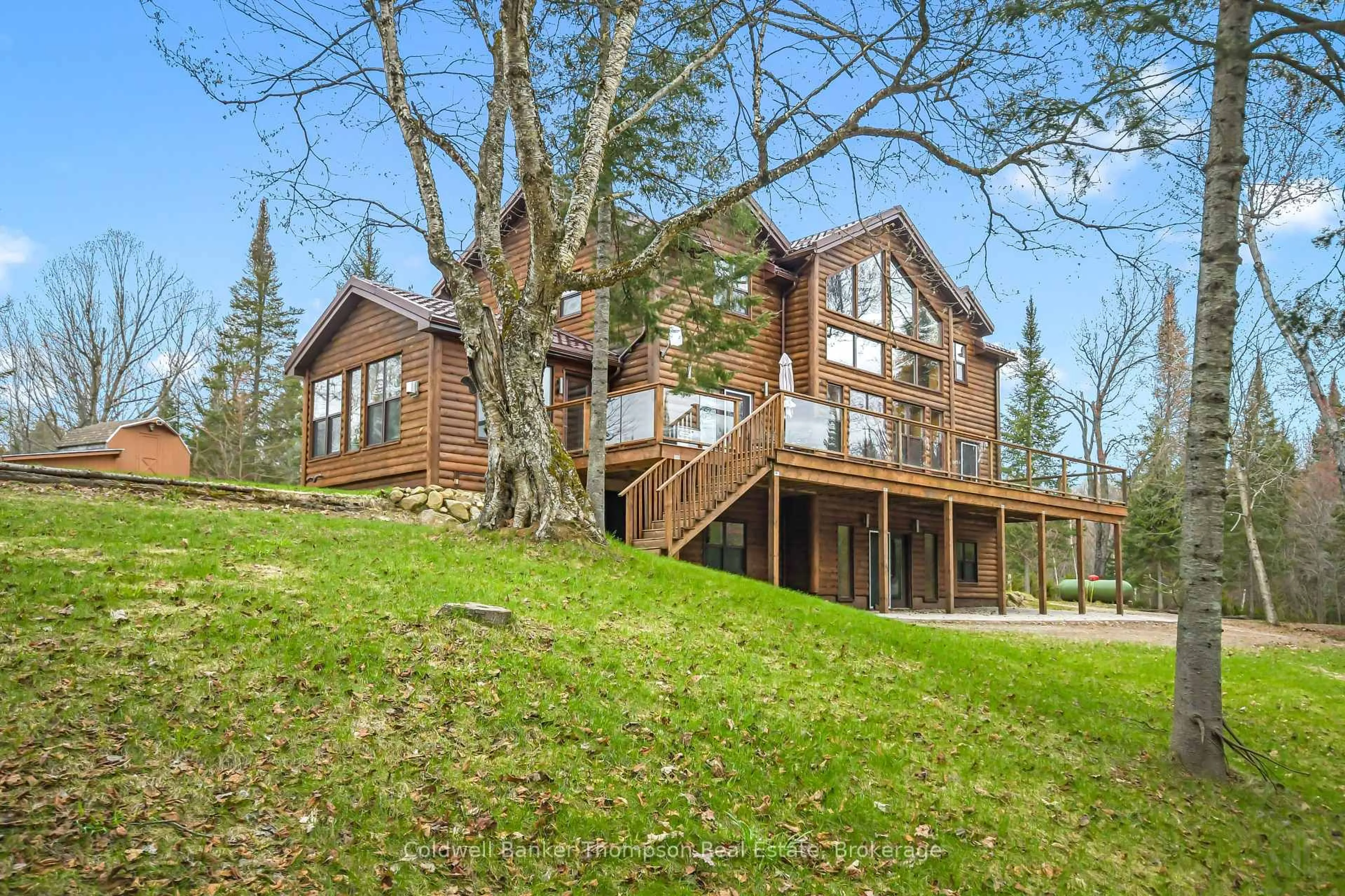 A pic from outside/outdoor area/front of a property/back of a property/a pic from drone, unknown for 390 Pine Grove Rd, Perry Ontario P0A 1J0