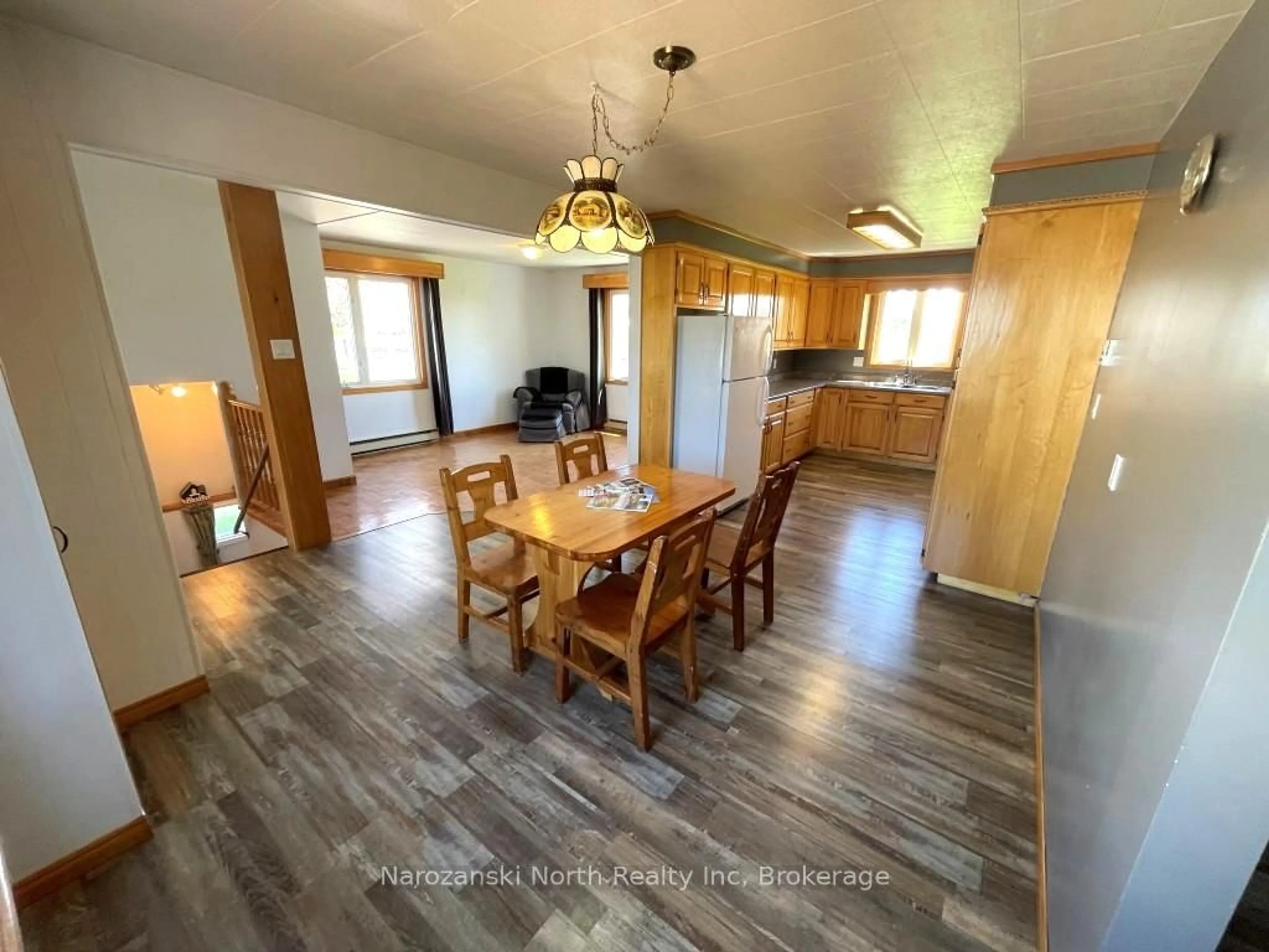 Dining room, wood/laminate floor for 15 Monetville Rd, French River Ontario P0M 2K0