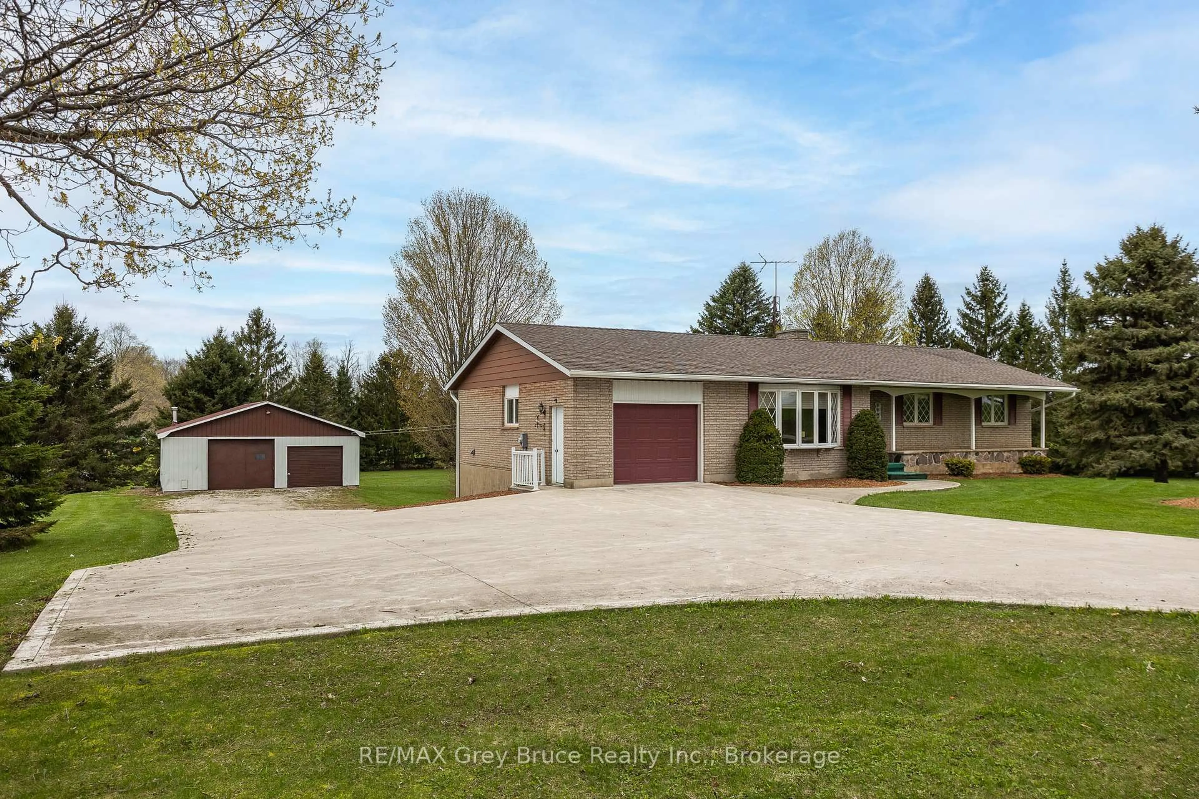A pic from outside/outdoor area/front of a property/back of a property/a pic from drone, street for 217438 Concession 3 Rd, Georgian Bluffs Ontario N4K 5N6