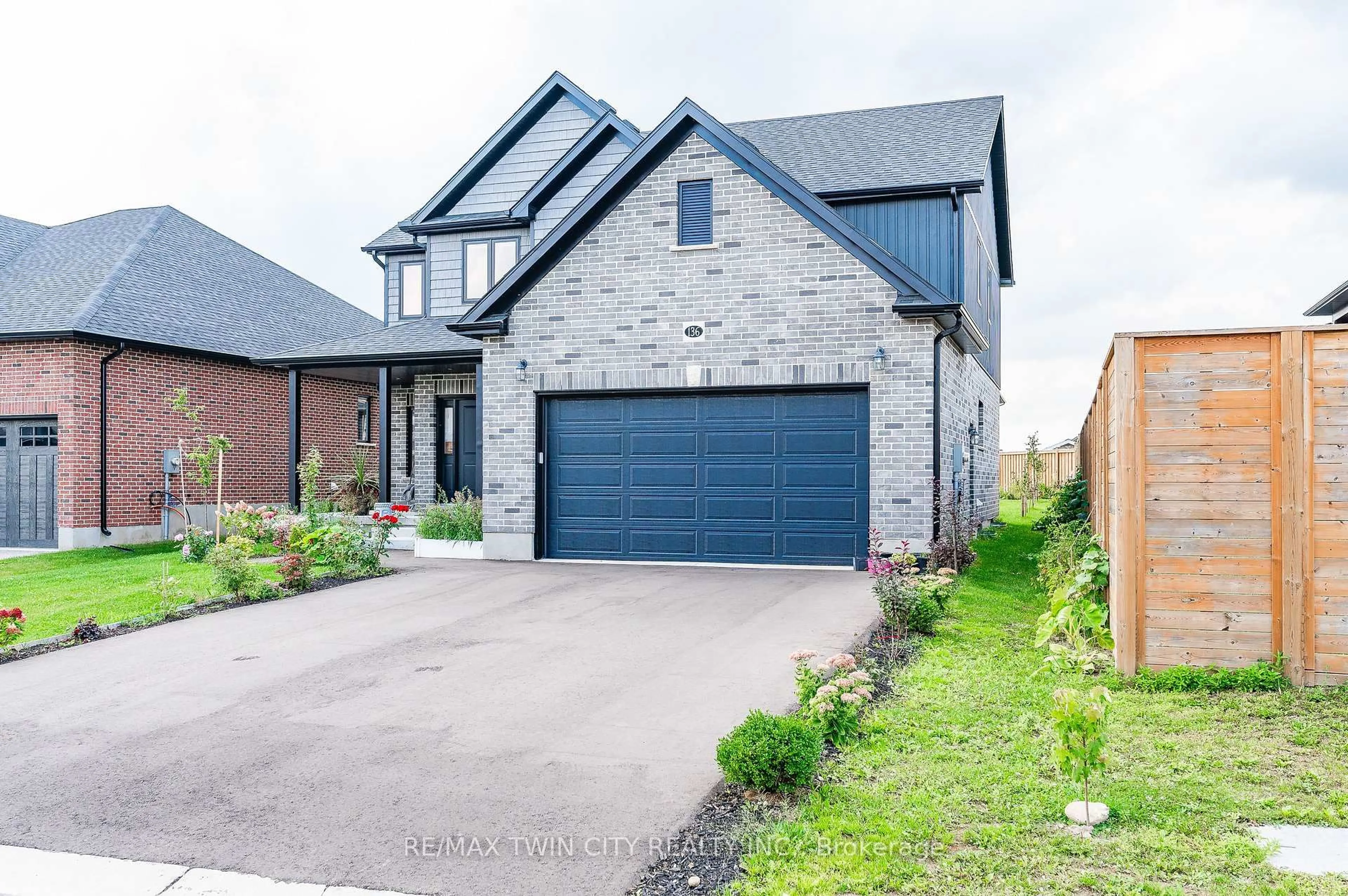Home with brick exterior material, street for 136 Village Rd, Wellesley Ontario N0B 2T0