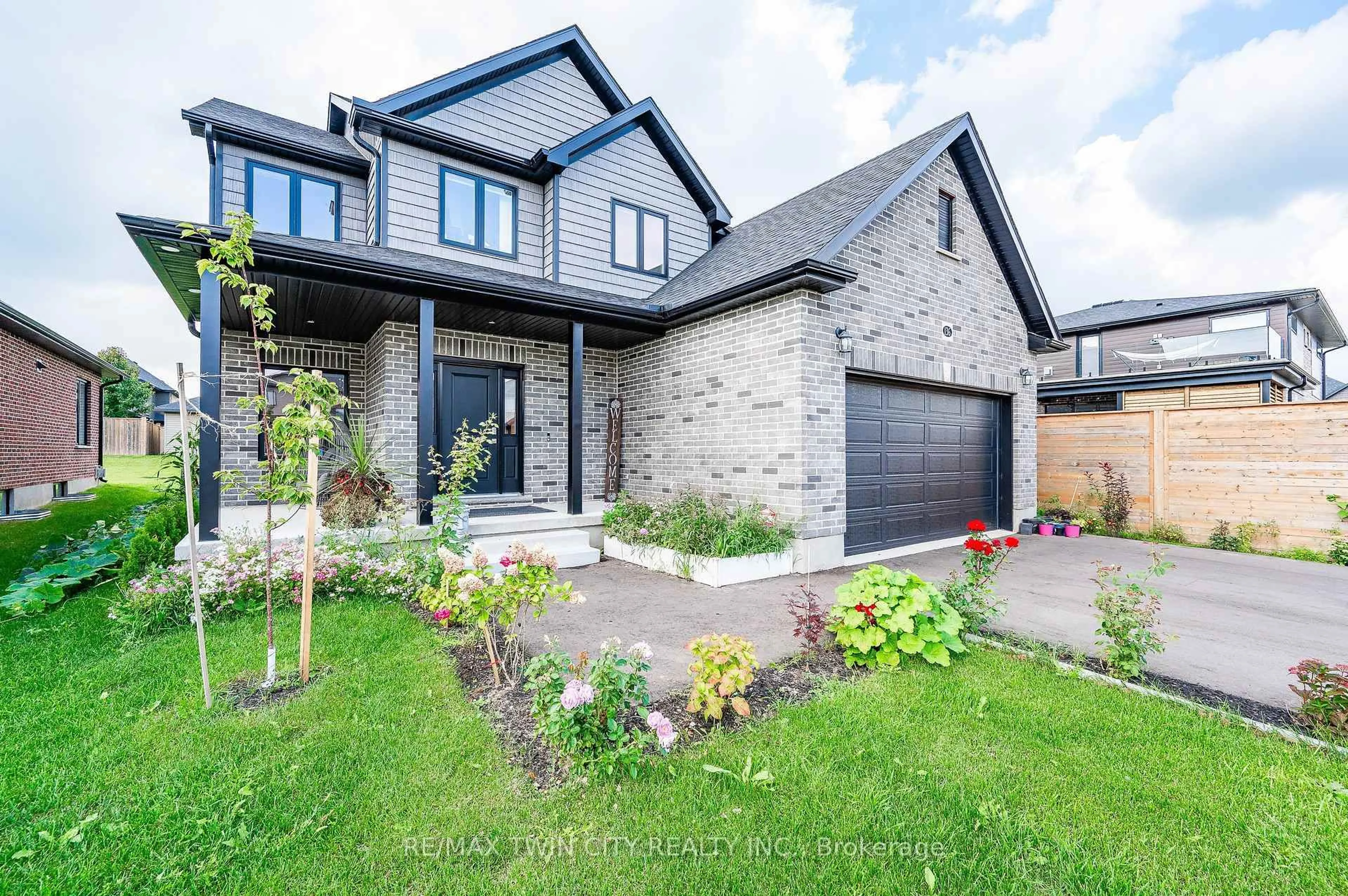 Home with brick exterior material, street for 136 Village Rd, Wellesley Ontario N0B 2T0