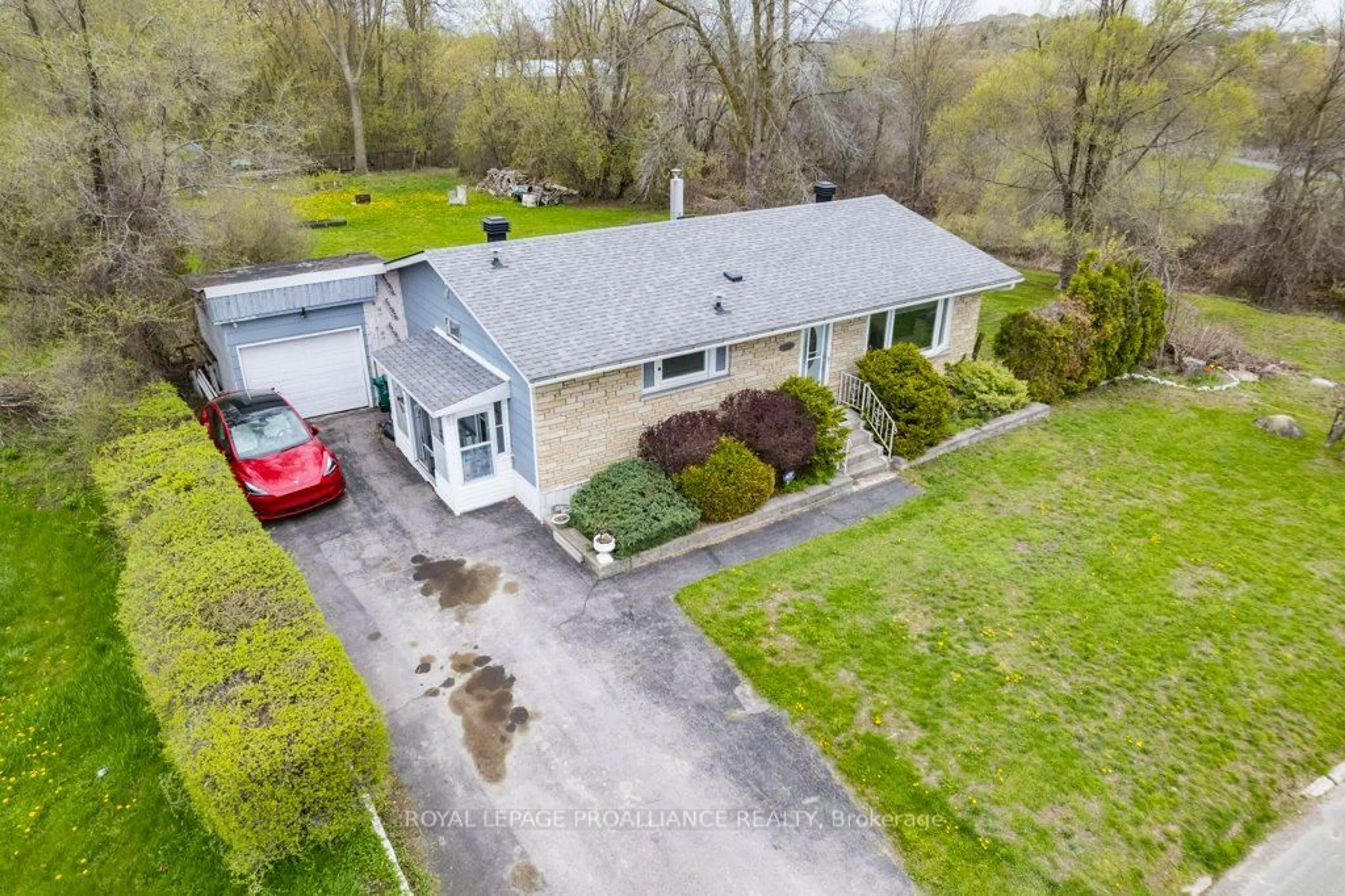 A pic from outside/outdoor area/front of a property/back of a property/a pic from drone, street for 86 Store St, Quinte West Ontario K8V 4J2