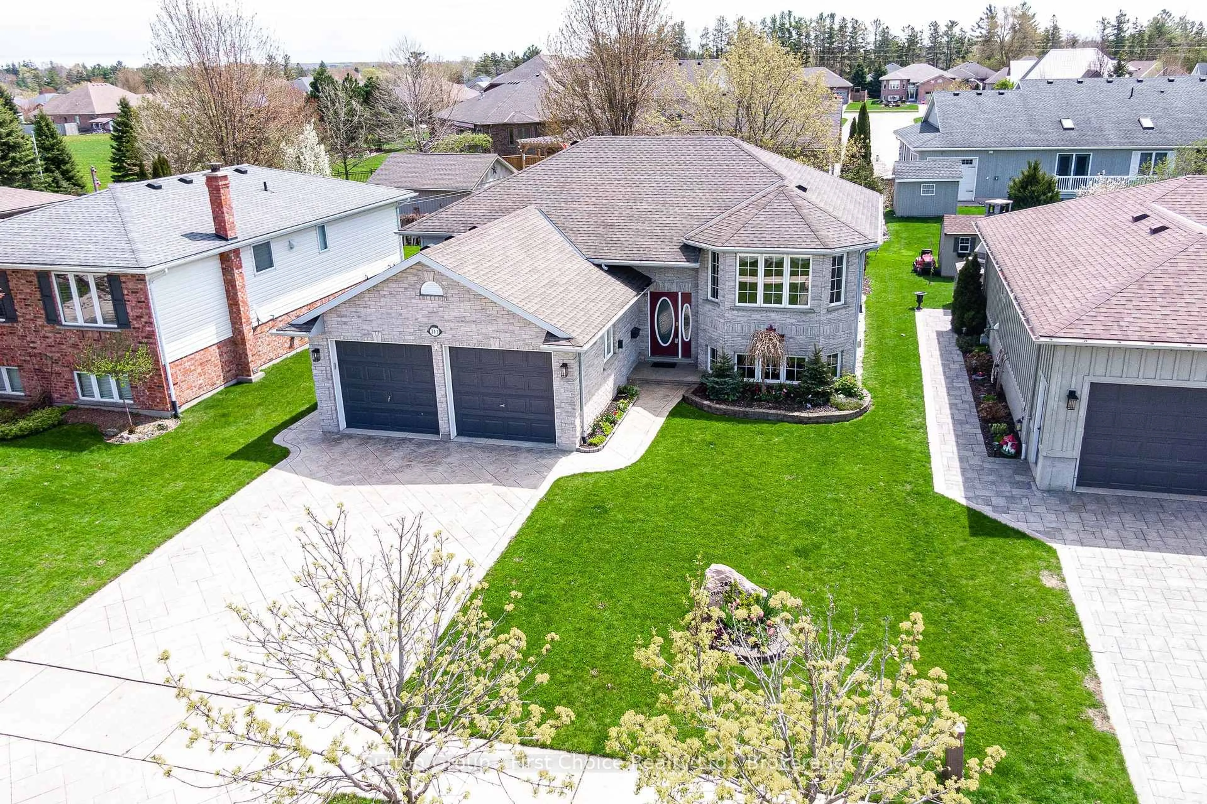 A pic from outside/outdoor area/front of a property/back of a property/a pic from drone, street for 203 Wimpole St, West Perth Ontario N0K 1N0