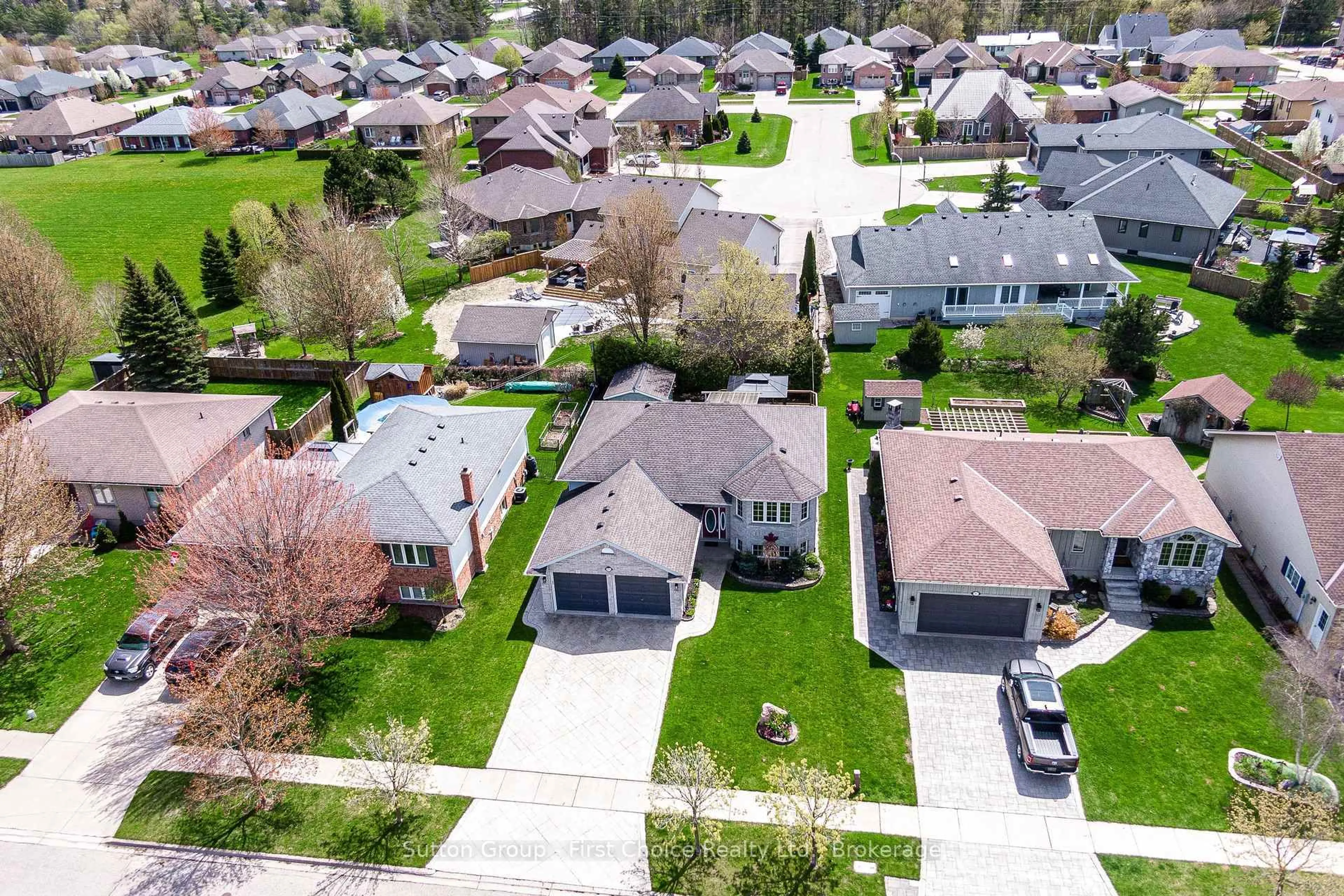 A pic from outside/outdoor area/front of a property/back of a property/a pic from drone, street for 203 Wimpole St, West Perth Ontario N0K 1N0
