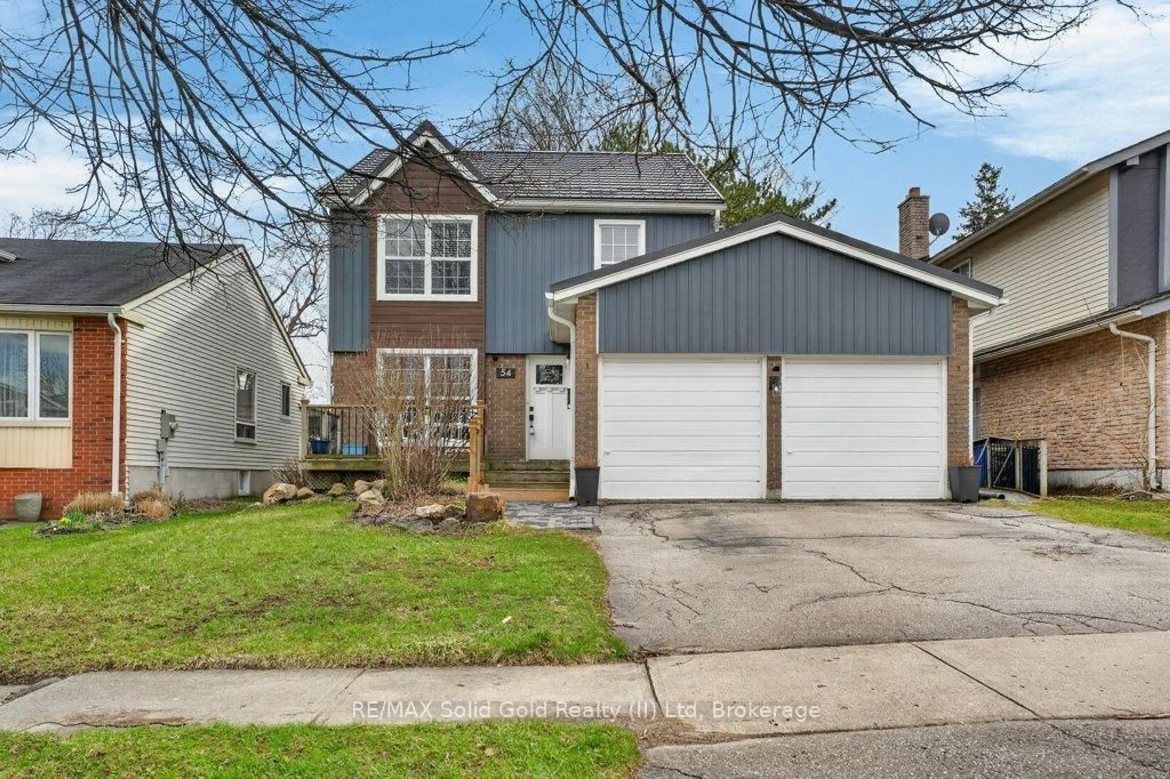 Home with vinyl exterior material, street for 54 Deerwood Cres, Kitchener Ontario N2N 1R3