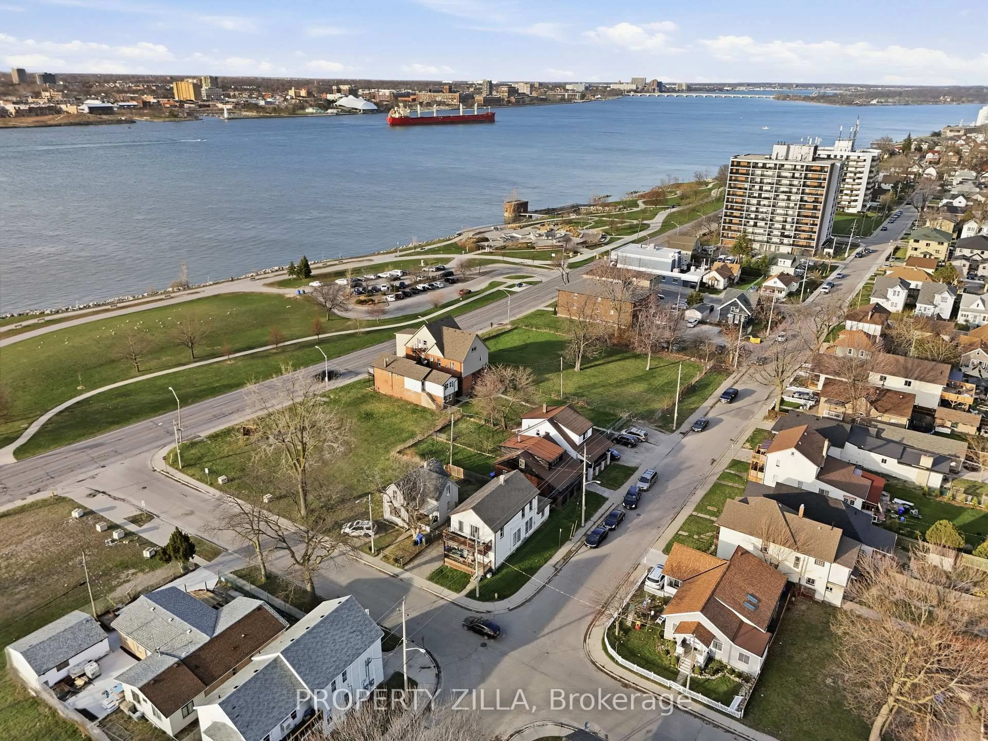 A pic from outside/outdoor area/front of a property/back of a property/a pic from drone, water/lake/river/ocean view for 819-829 RIVERSIDE Dr, Windsor Ontario N9A 2T4