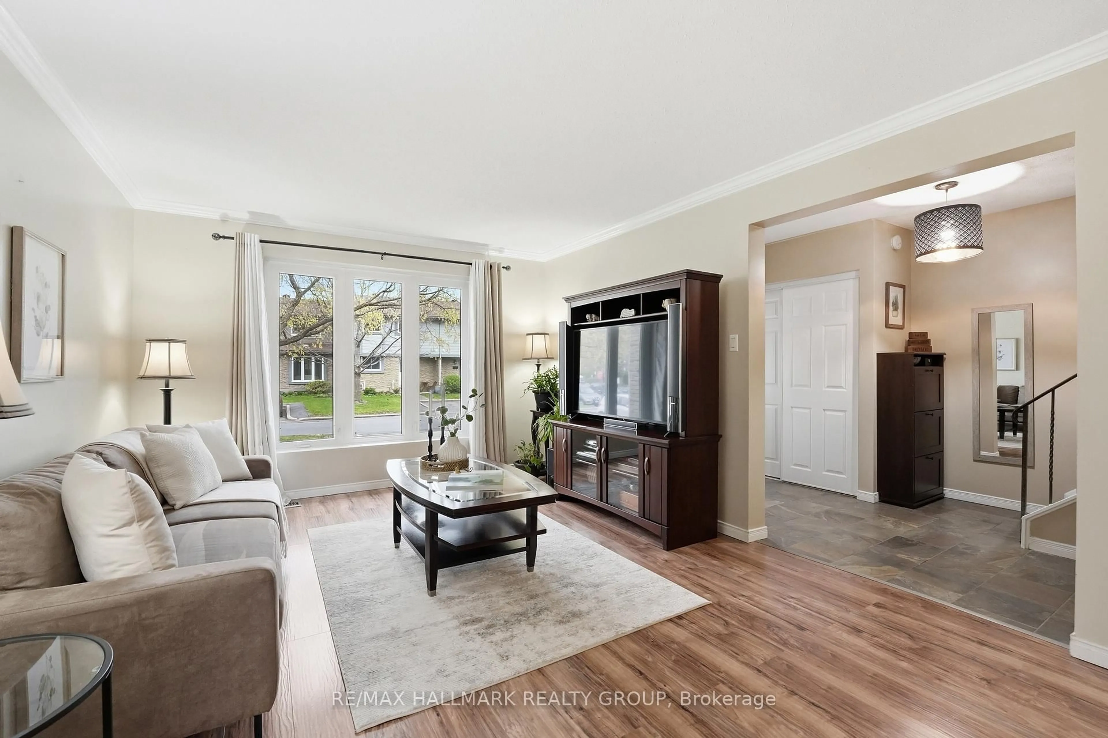 Living room with furniture, unknown for 2336 Orient Park Dr #59, Ottawa Ontario K1B 4N5